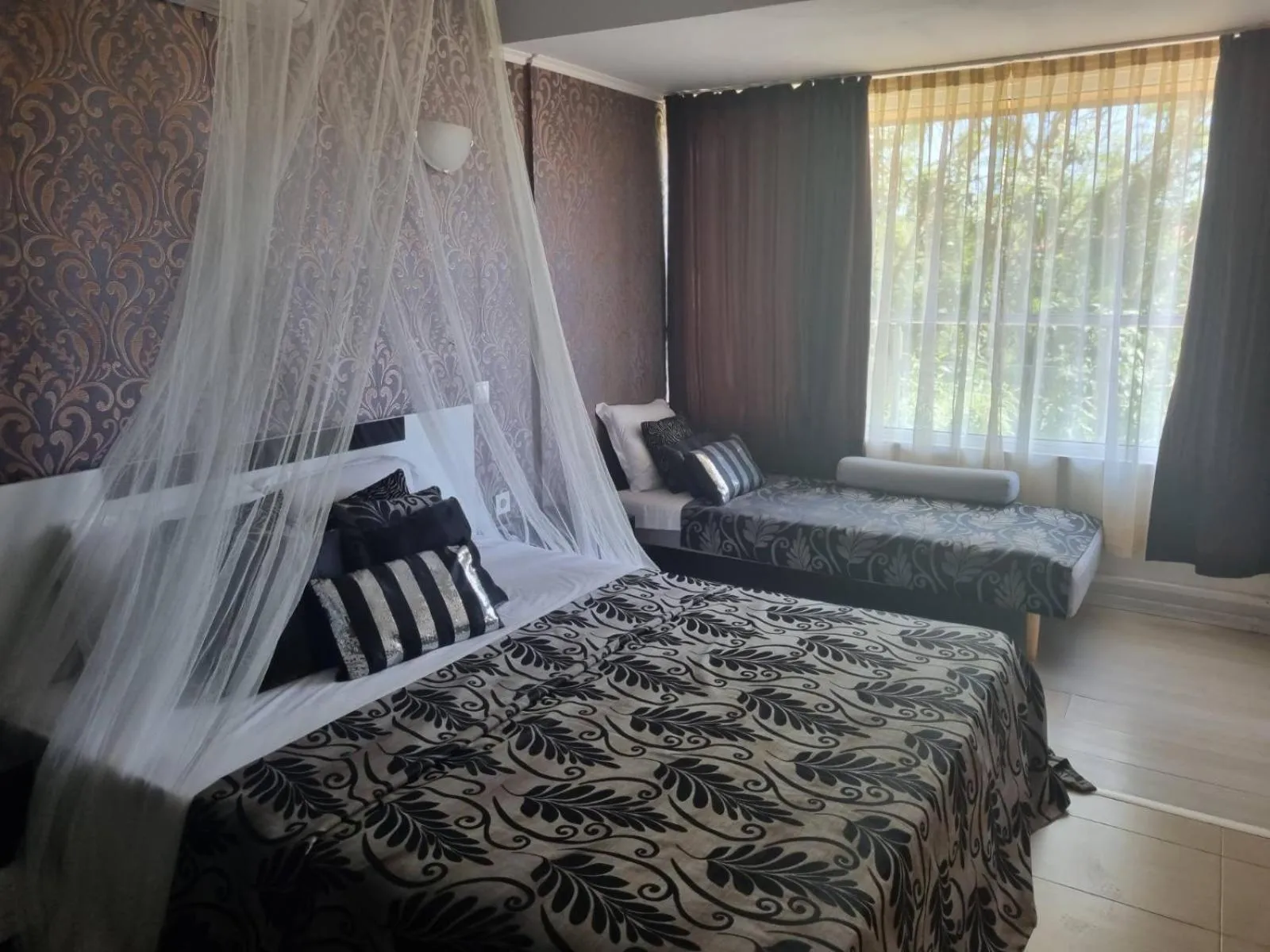 Bed in Sunrise Hotel