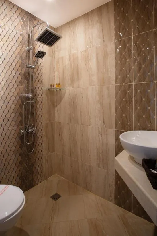 Bathroom in Sunrise Hotel