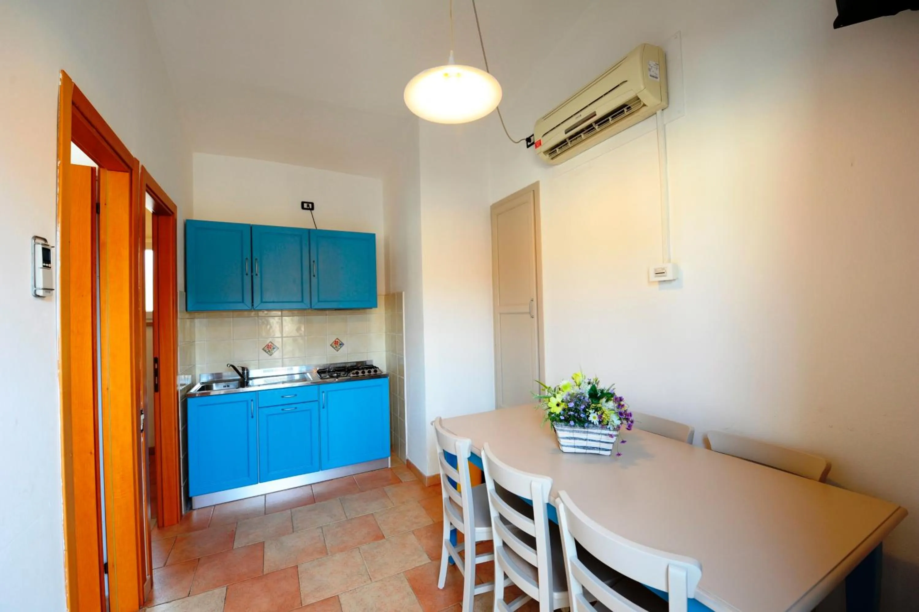 Kitchen or kitchenette in Camping Bella Italia