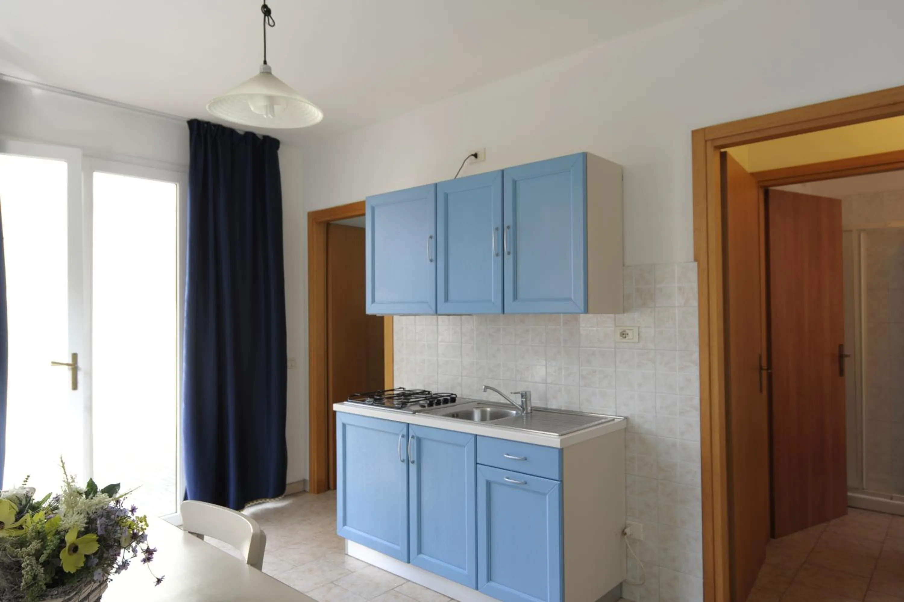 Kitchen or kitchenette in Camping Bella Italia