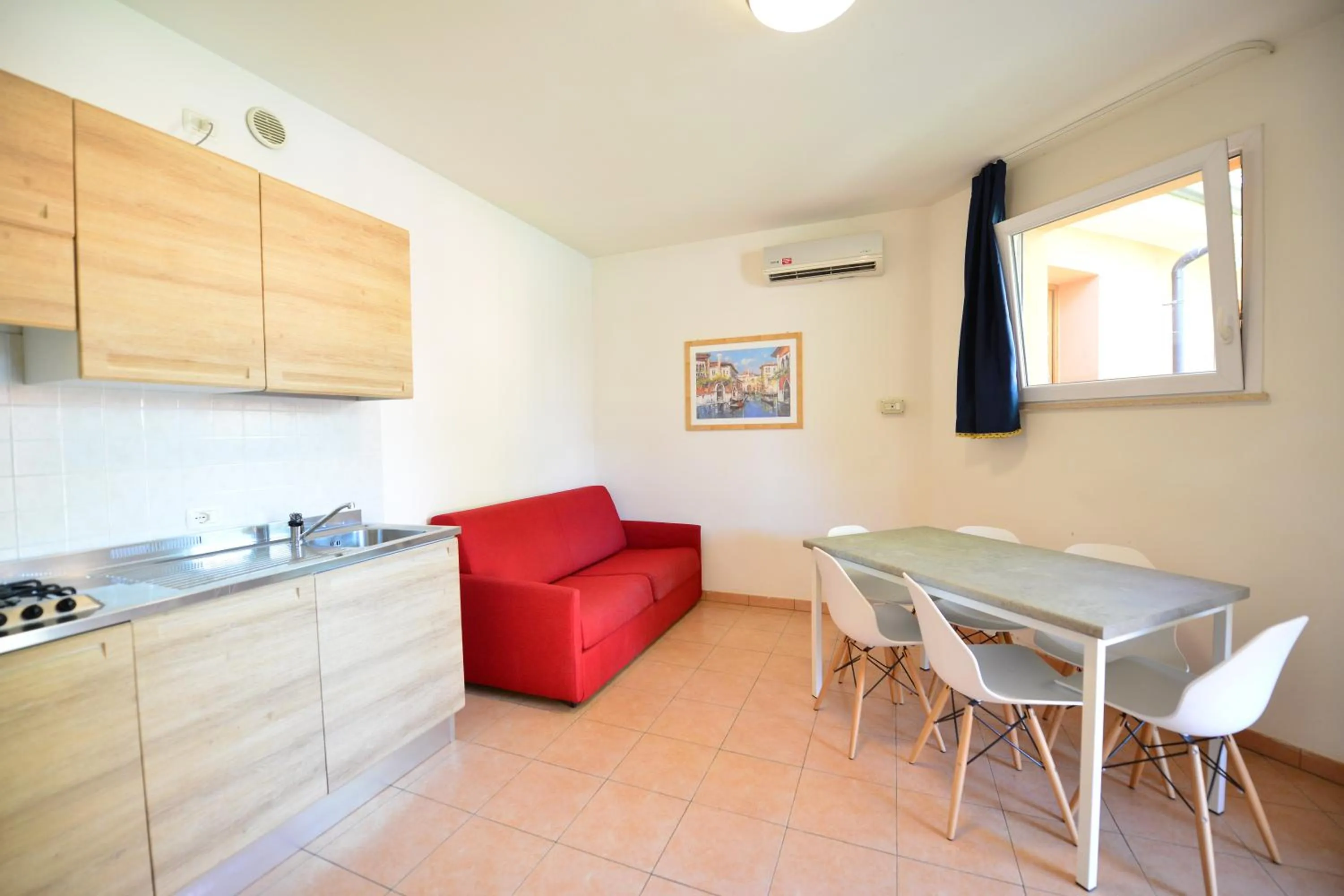 Kitchen or kitchenette in Camping Bella Italia