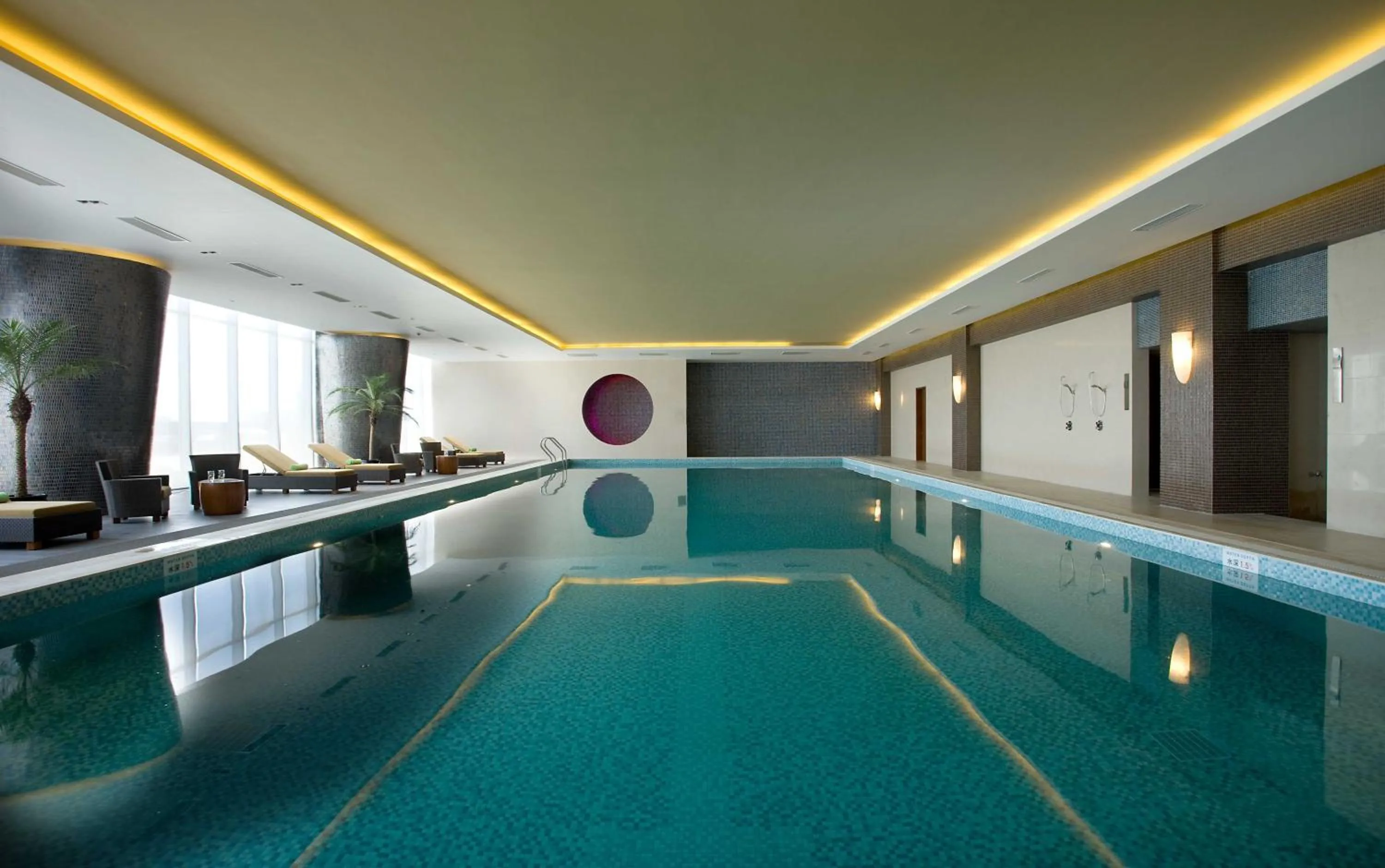 Swimming pool in Crowne Plaza Tianjin Binhai by IHG