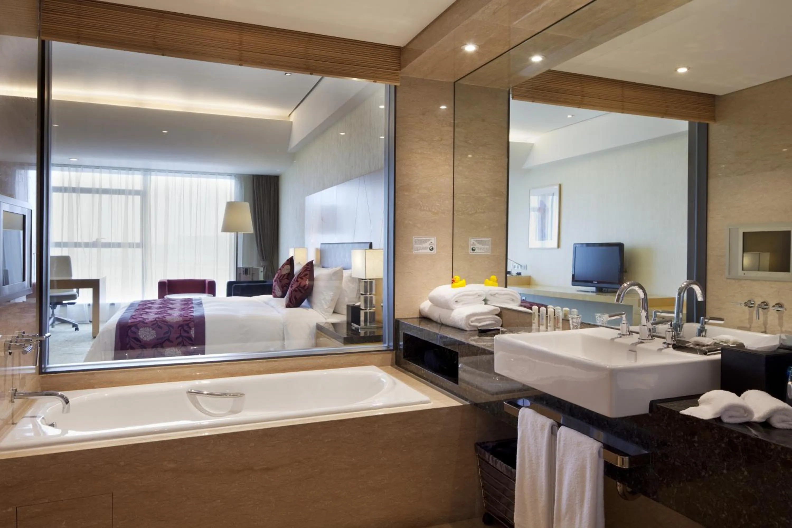 Bathroom, Bed in Crowne Plaza Tianjin Binhai by IHG