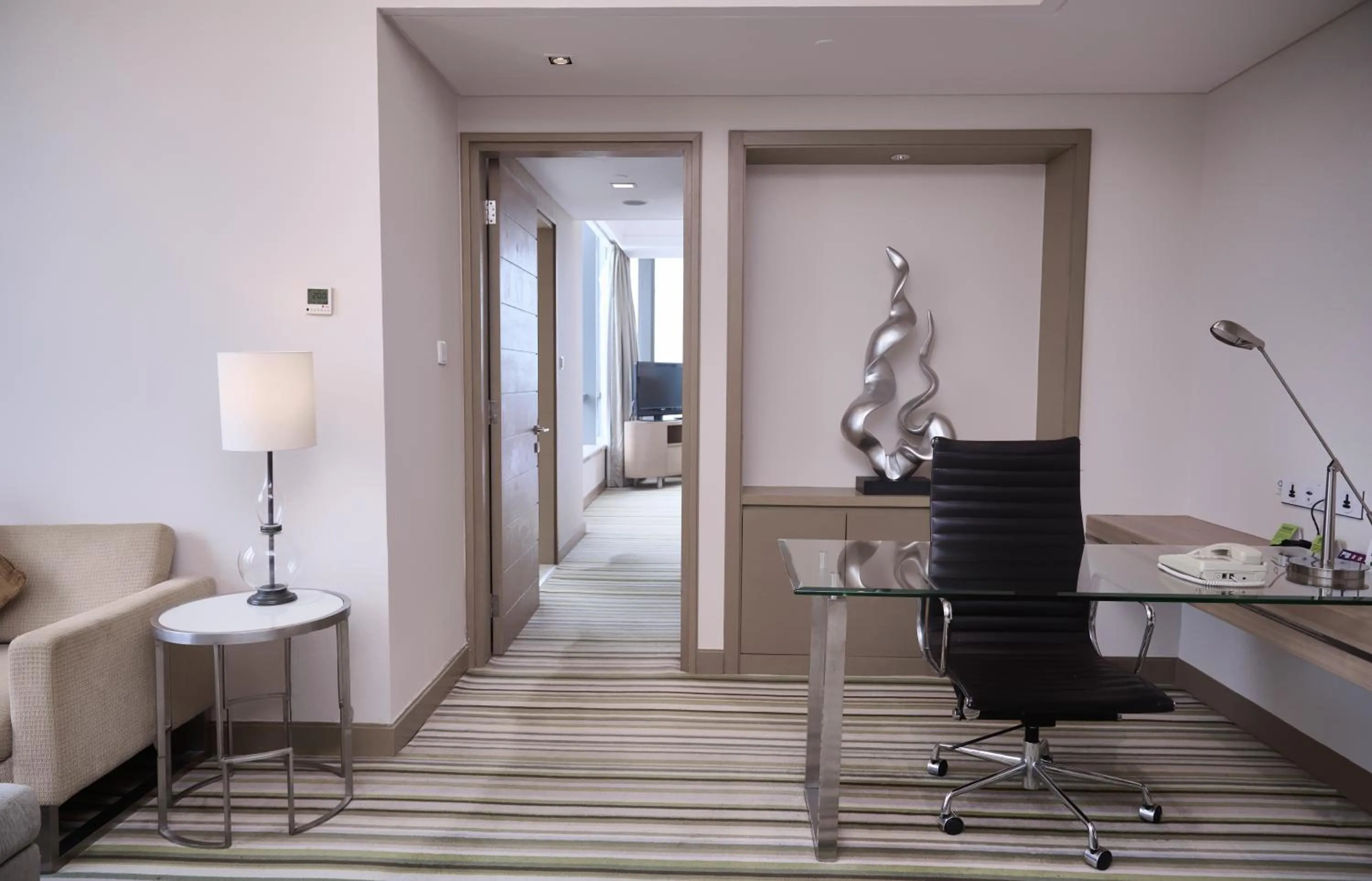 Living room in Holiday Inn Tianjin Riverside by IHG