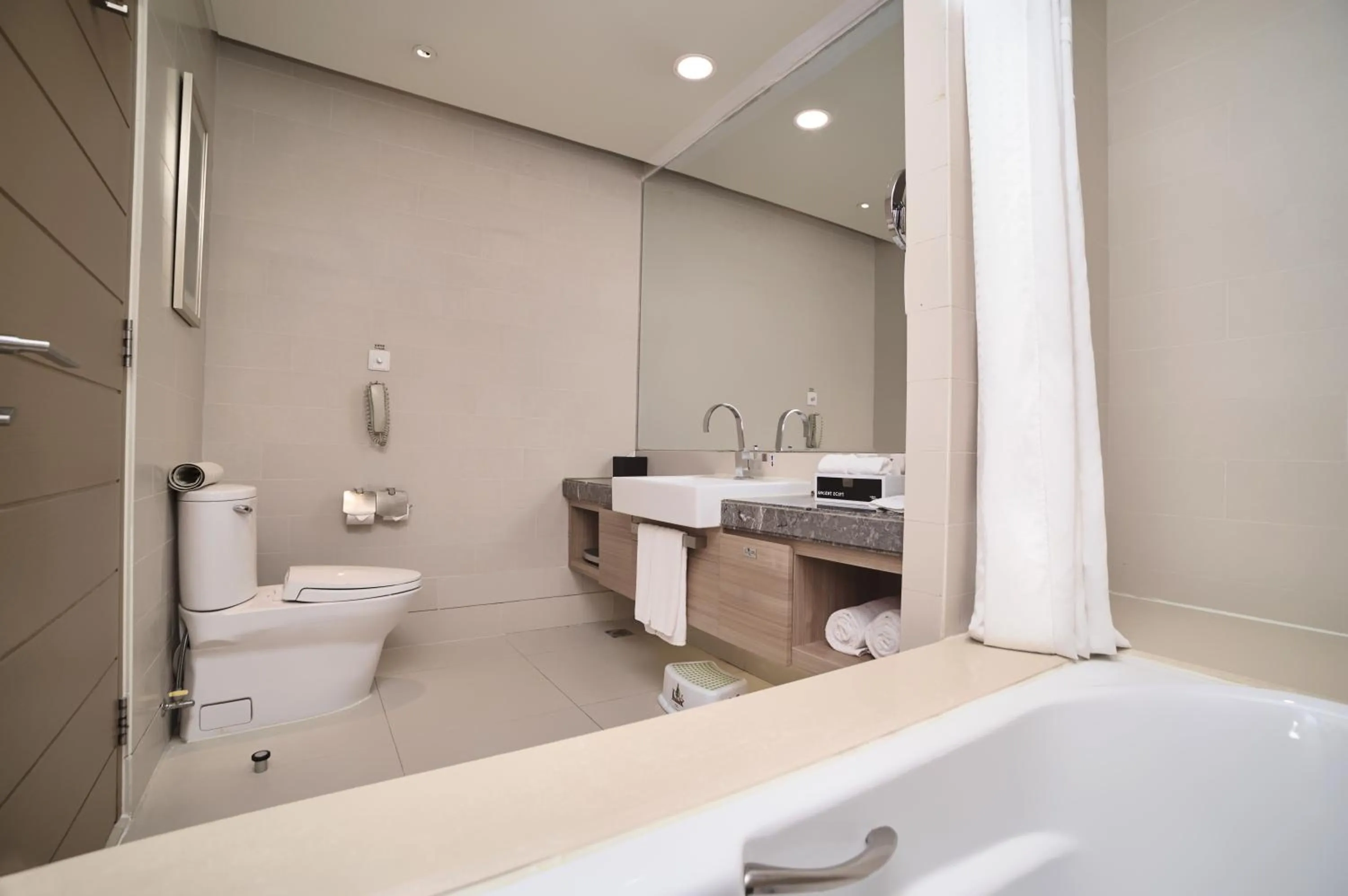 Toilet in Holiday Inn Tianjin Riverside by IHG