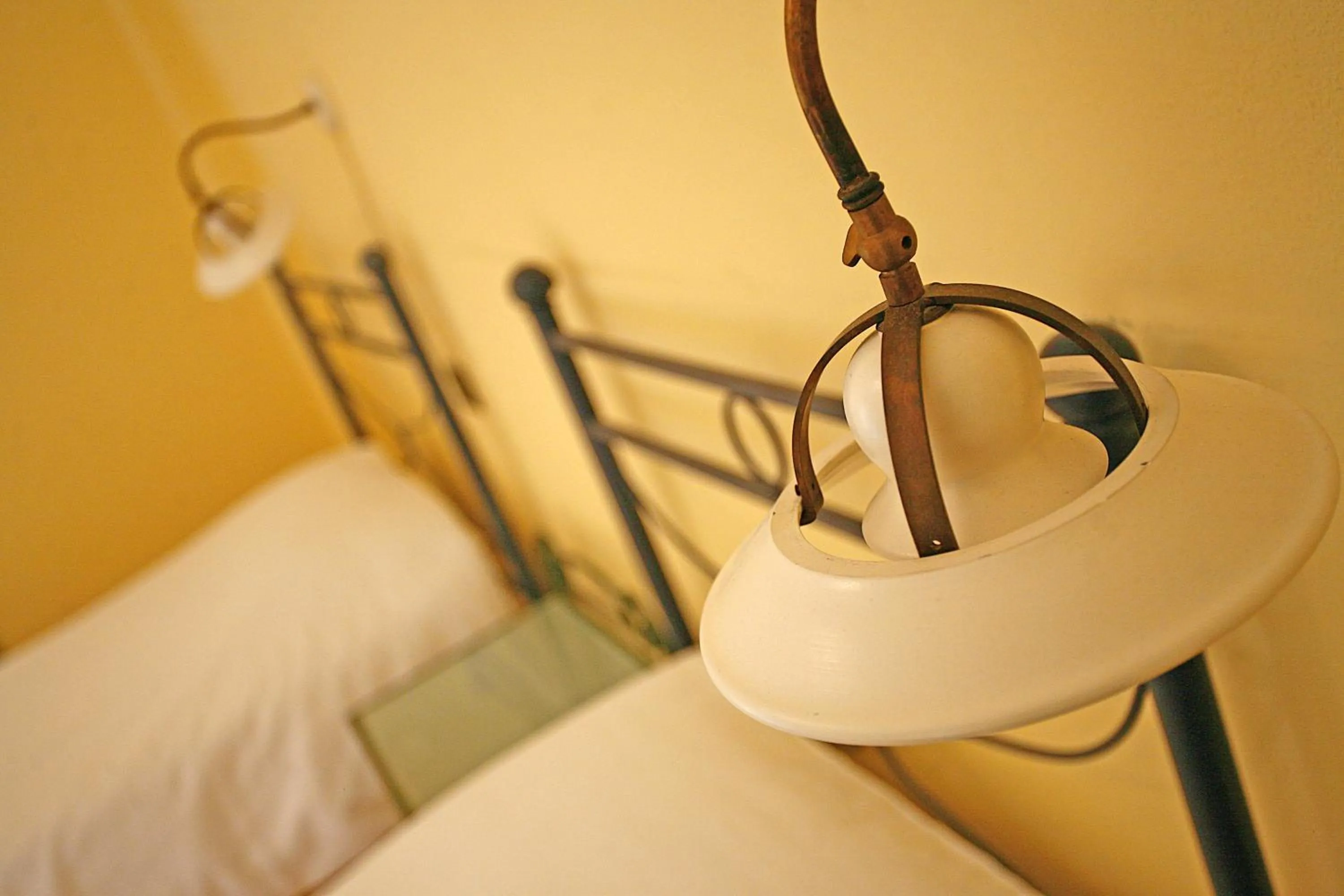 Decorative detail, Bed in Hotel Antichi Cortili