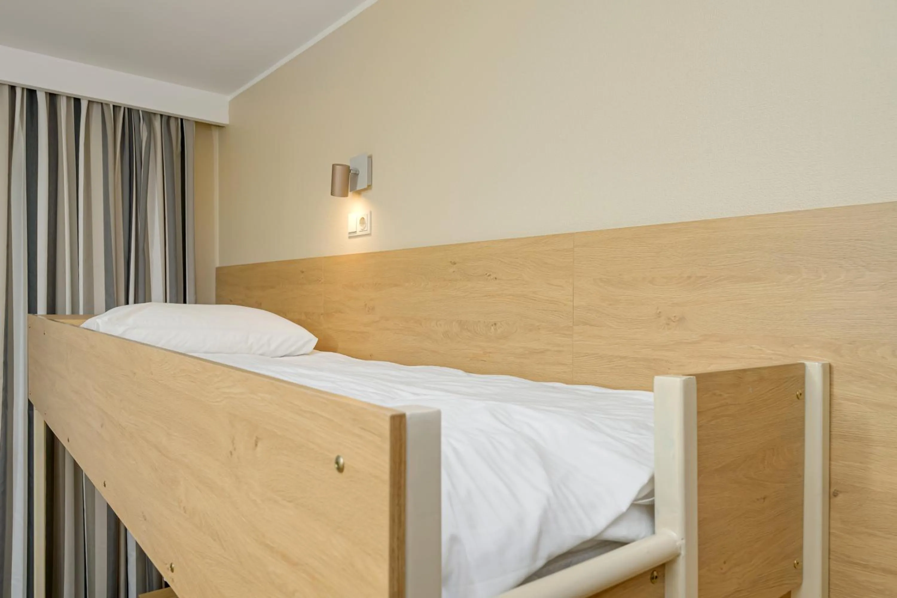 Bed in Hotel Rocca al Mare