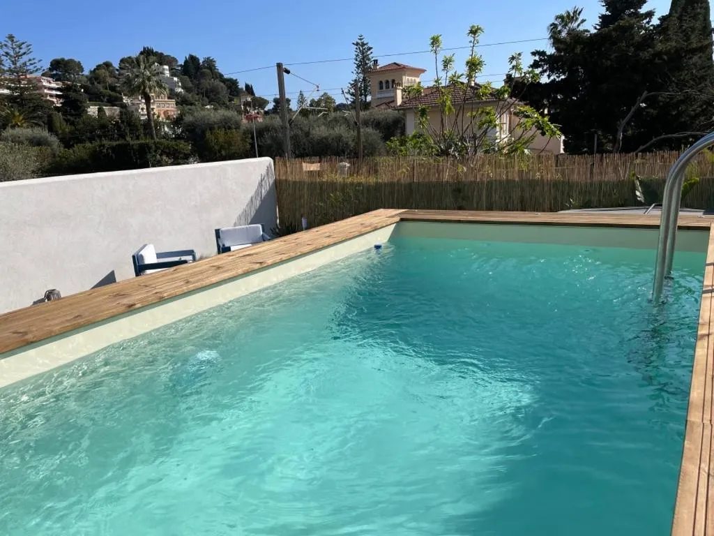 Swimming pool in Hôtel La Villa Patricia - Charme et Tradition