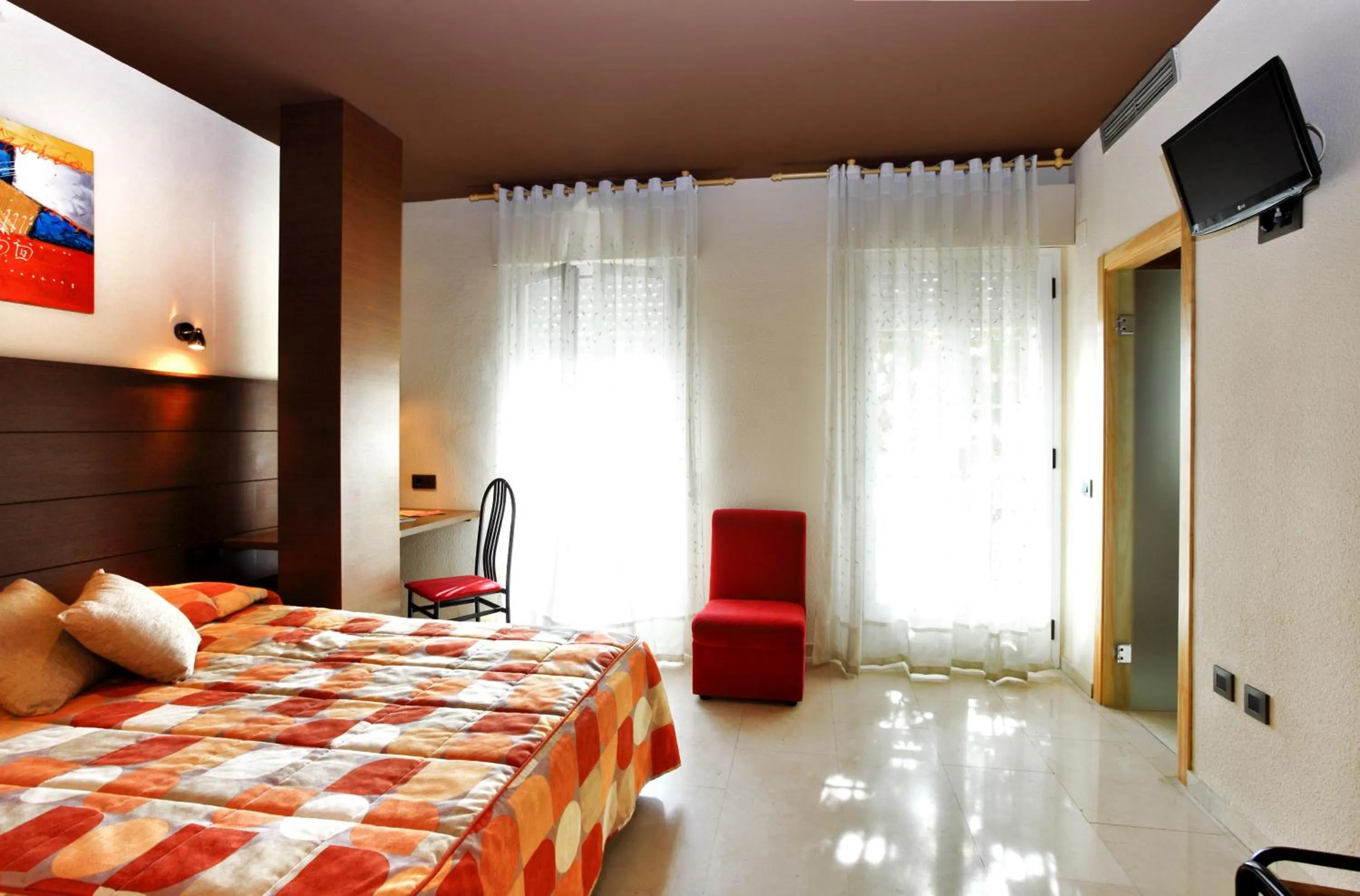 Bed in Hotel Navarro