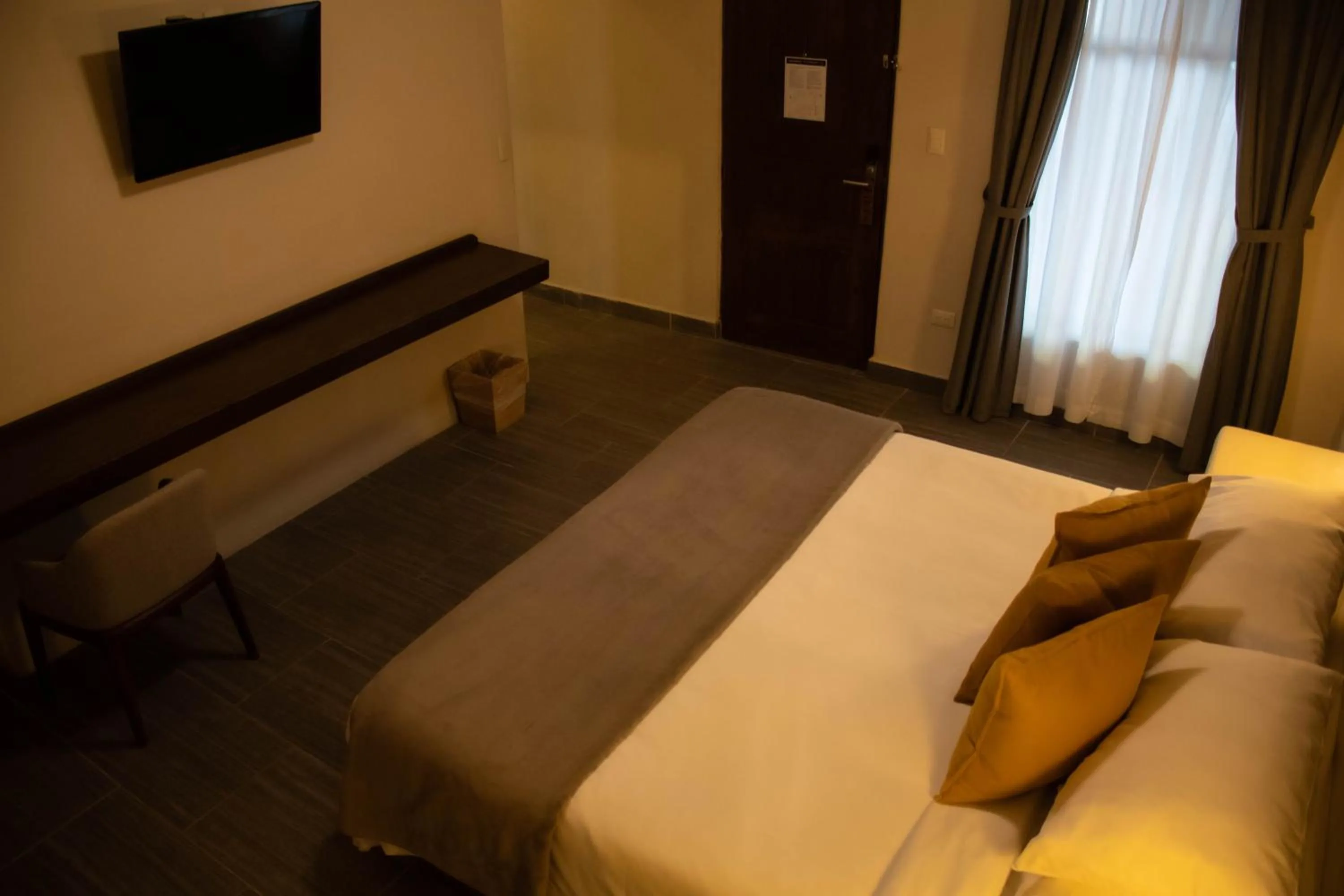 Photo of the whole room, Bed in Hacienda 1800