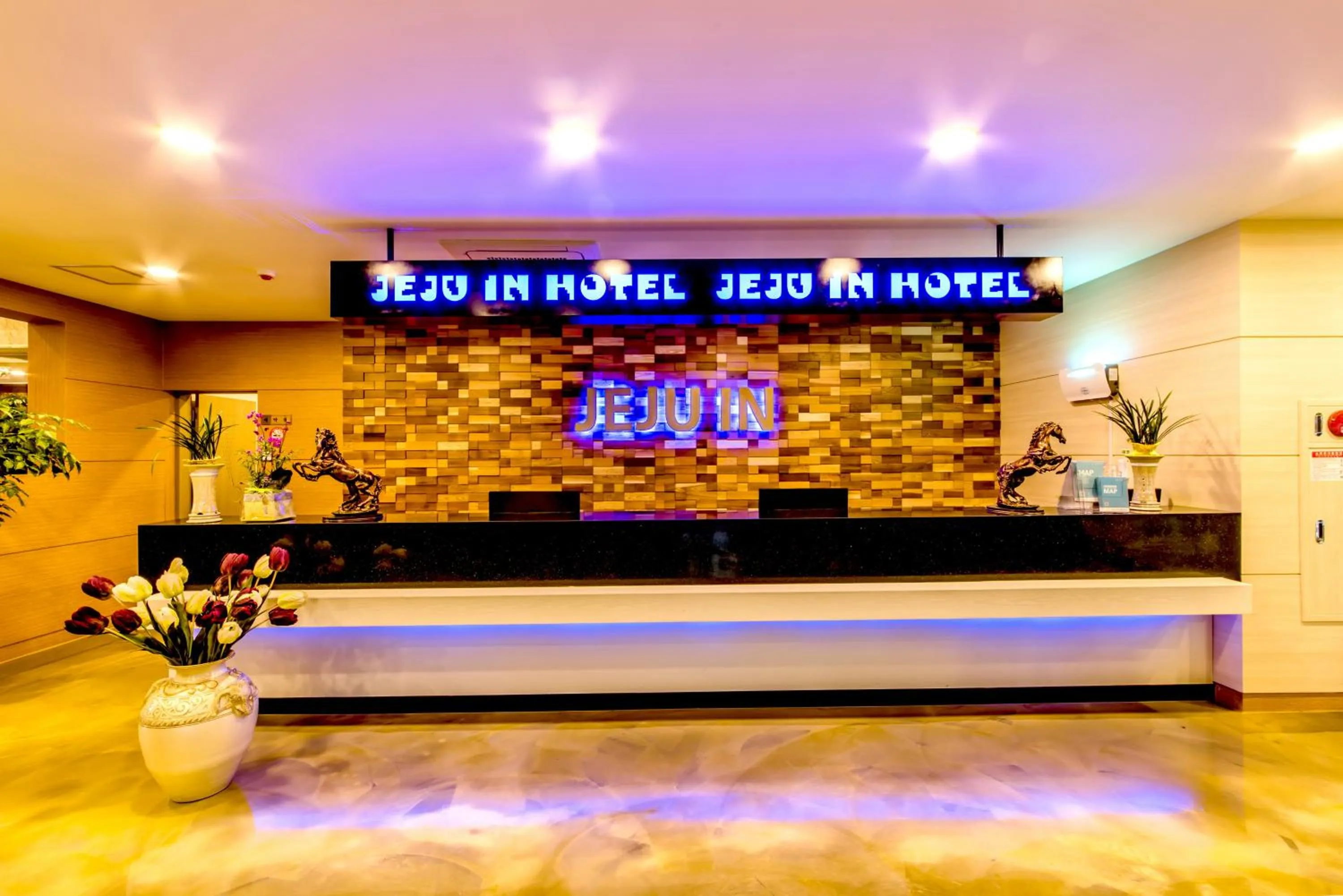 Property logo or sign in Jeju In Hotel