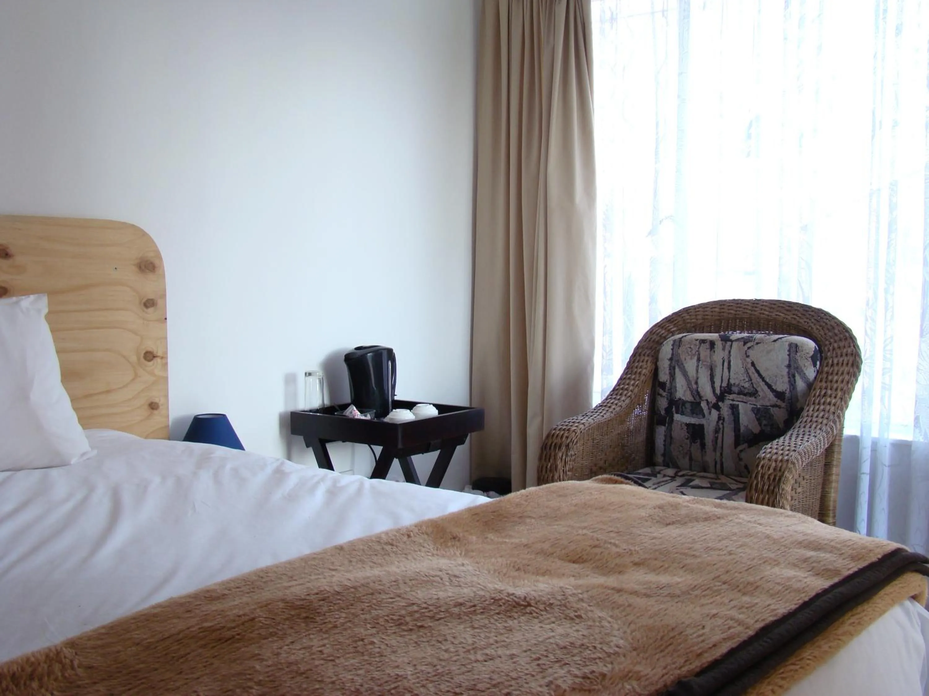 Seating area, Bed in Louhallas Accommodation