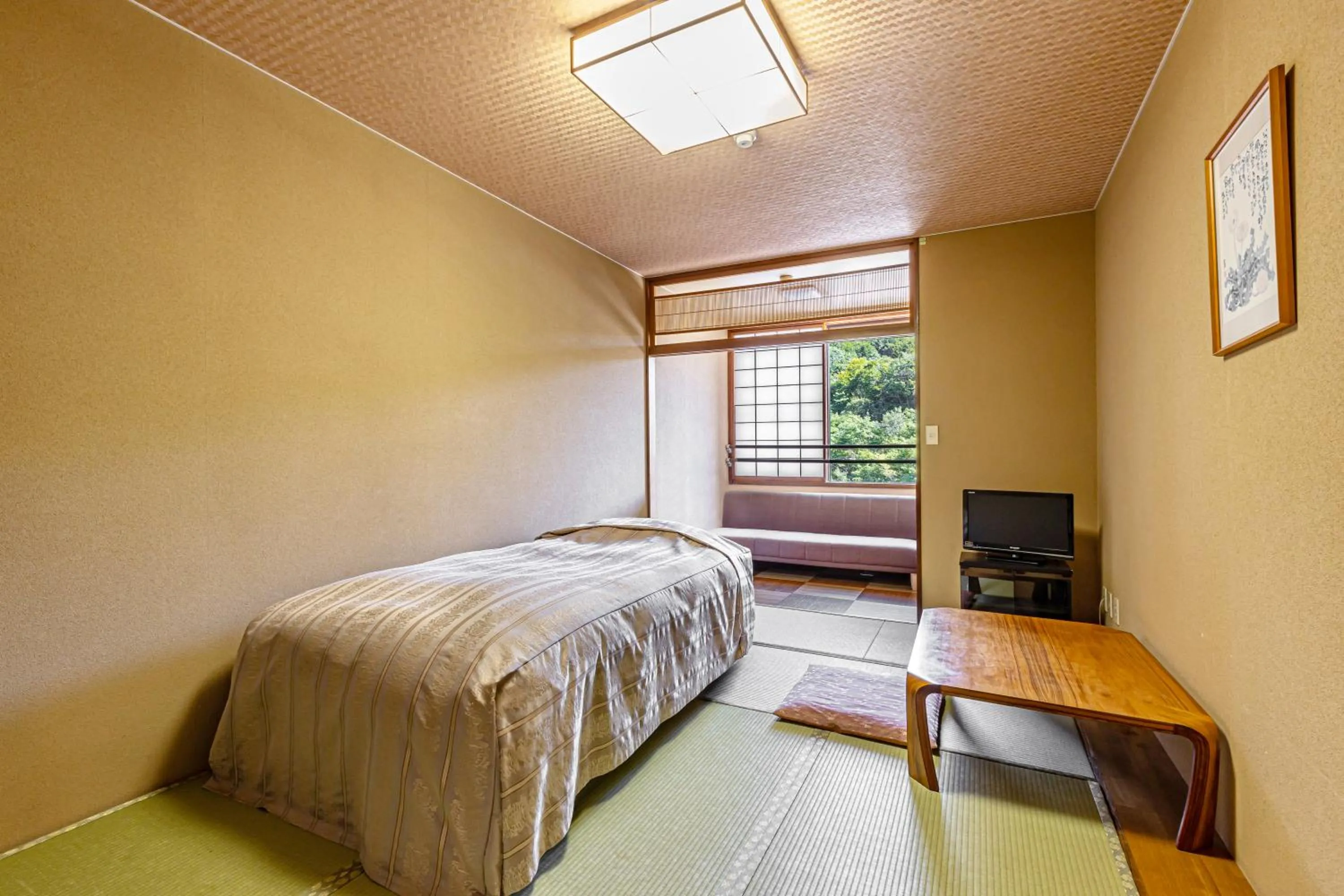 Bedroom, Bed in Plaza Hotel Sanrokuso