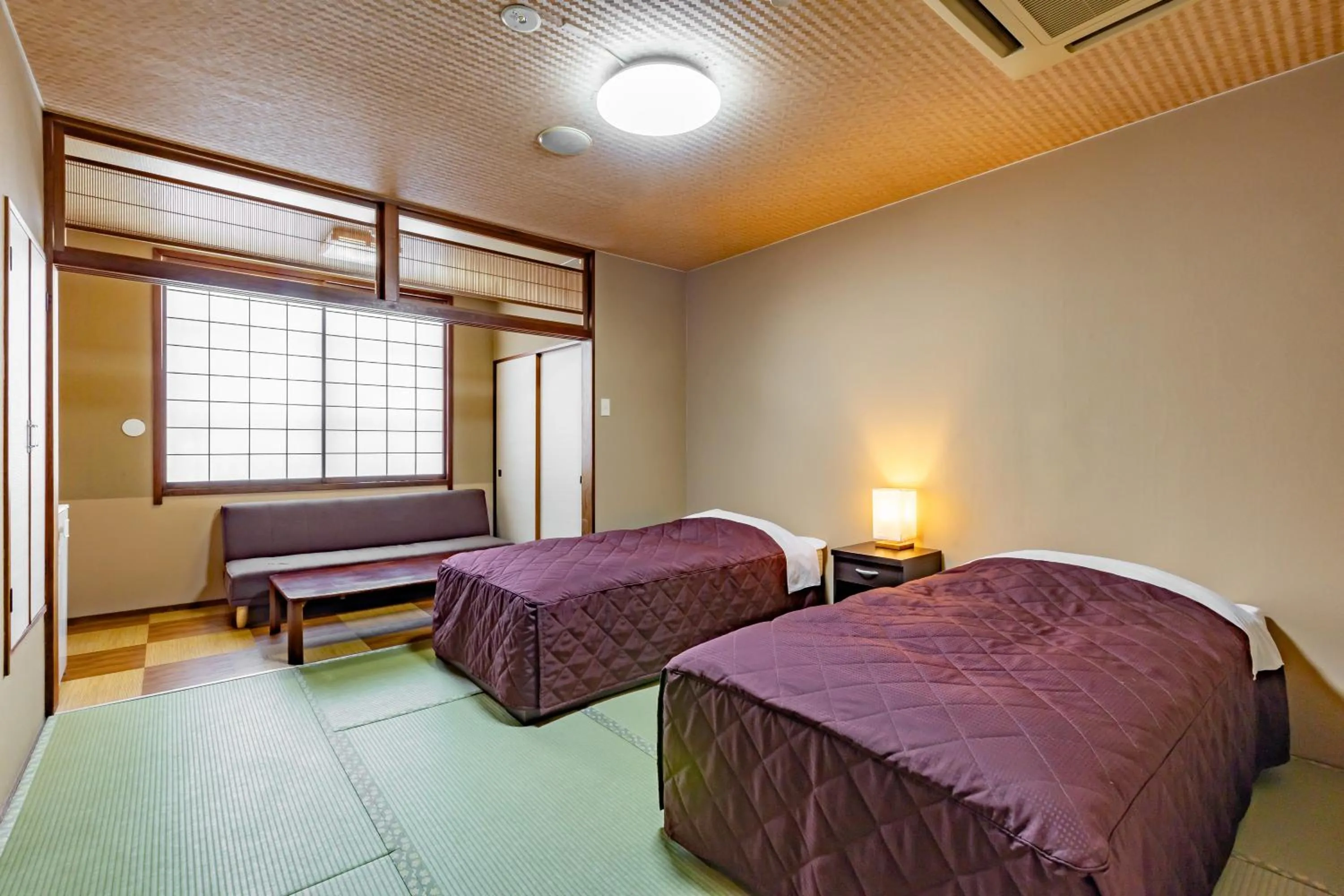 Photo of the whole room, Bed in Plaza Hotel Sanrokuso