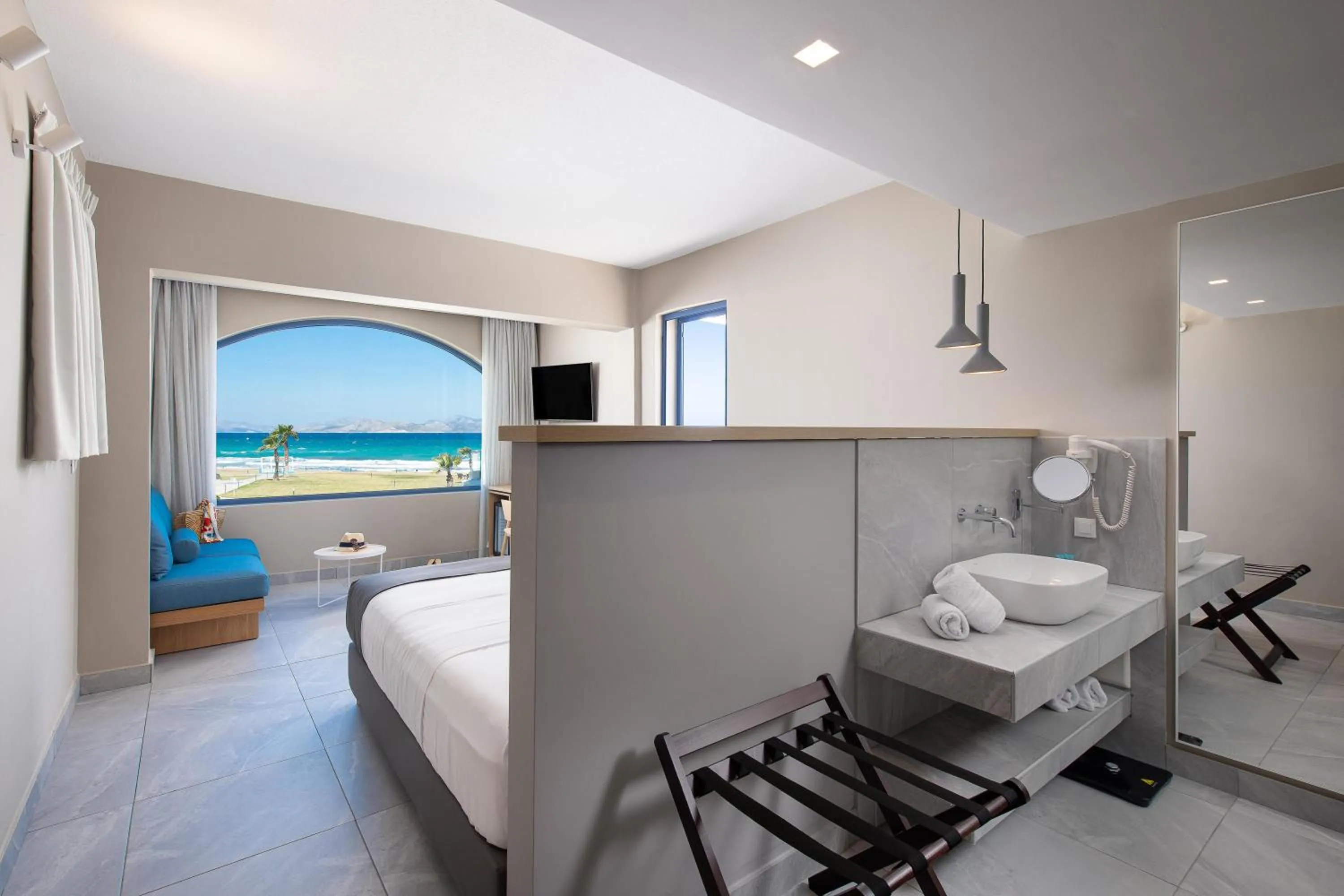 Photo of the whole room, Bed in The Aeolos Beach Hotel