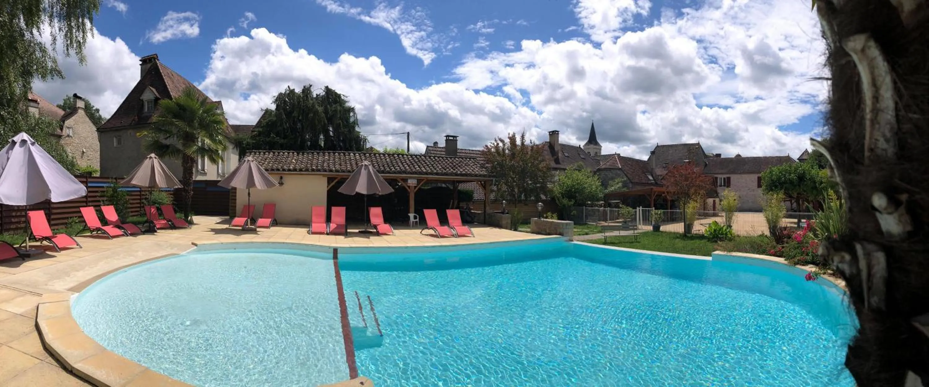 Pool view in Logis Hotel Grangier
