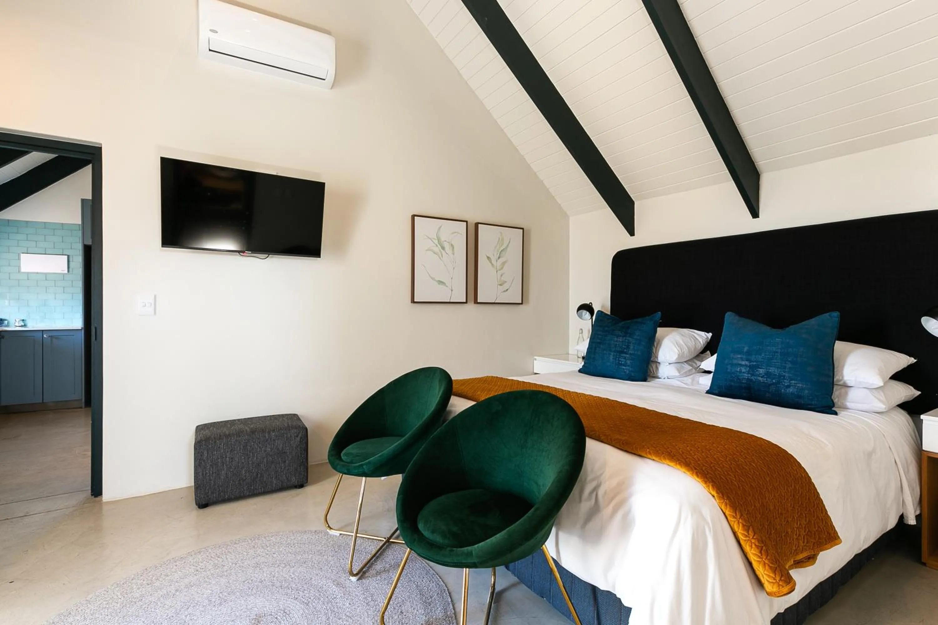 Bed in Abalone Hotel & Villas