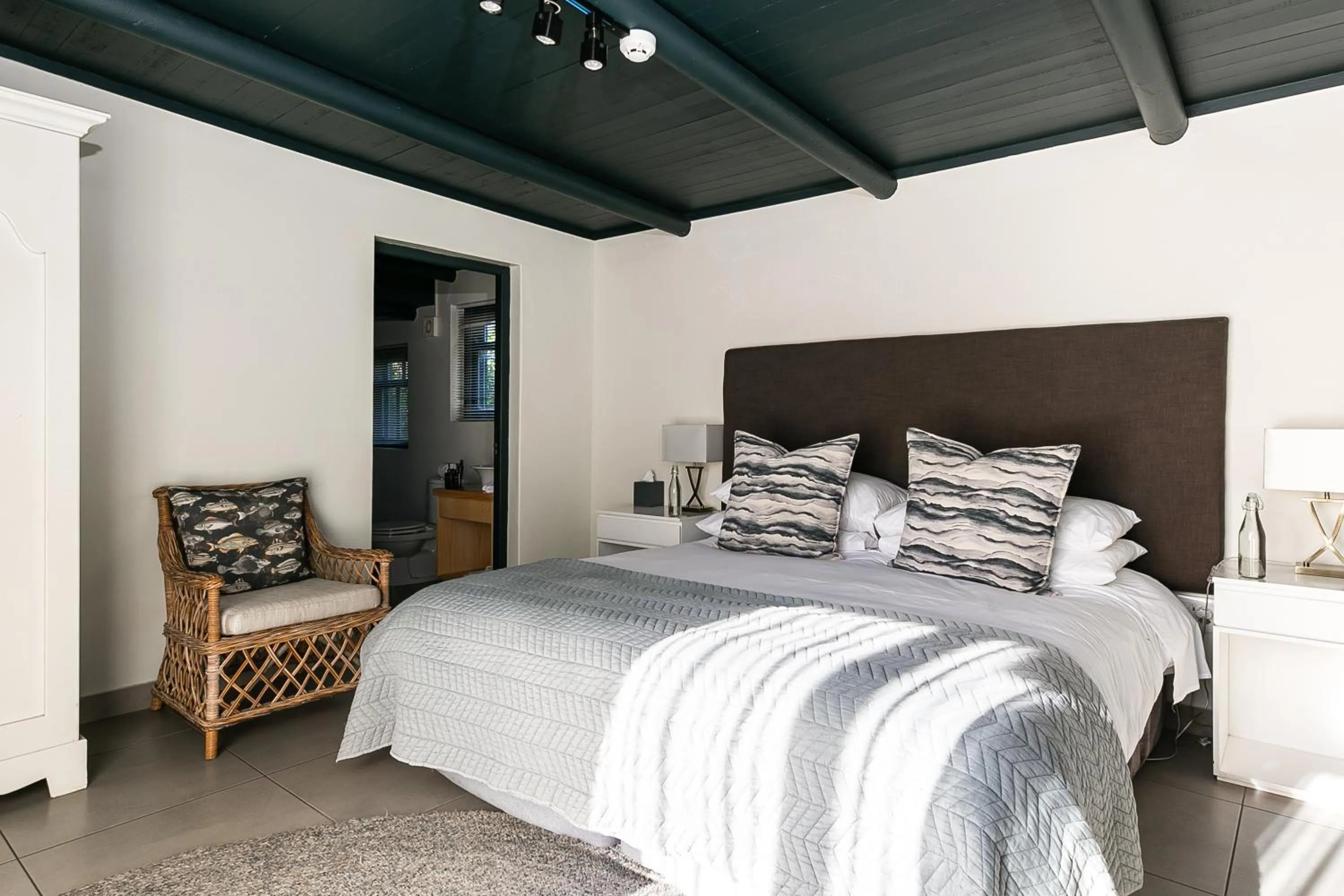 Bed in Abalone Hotel & Villas