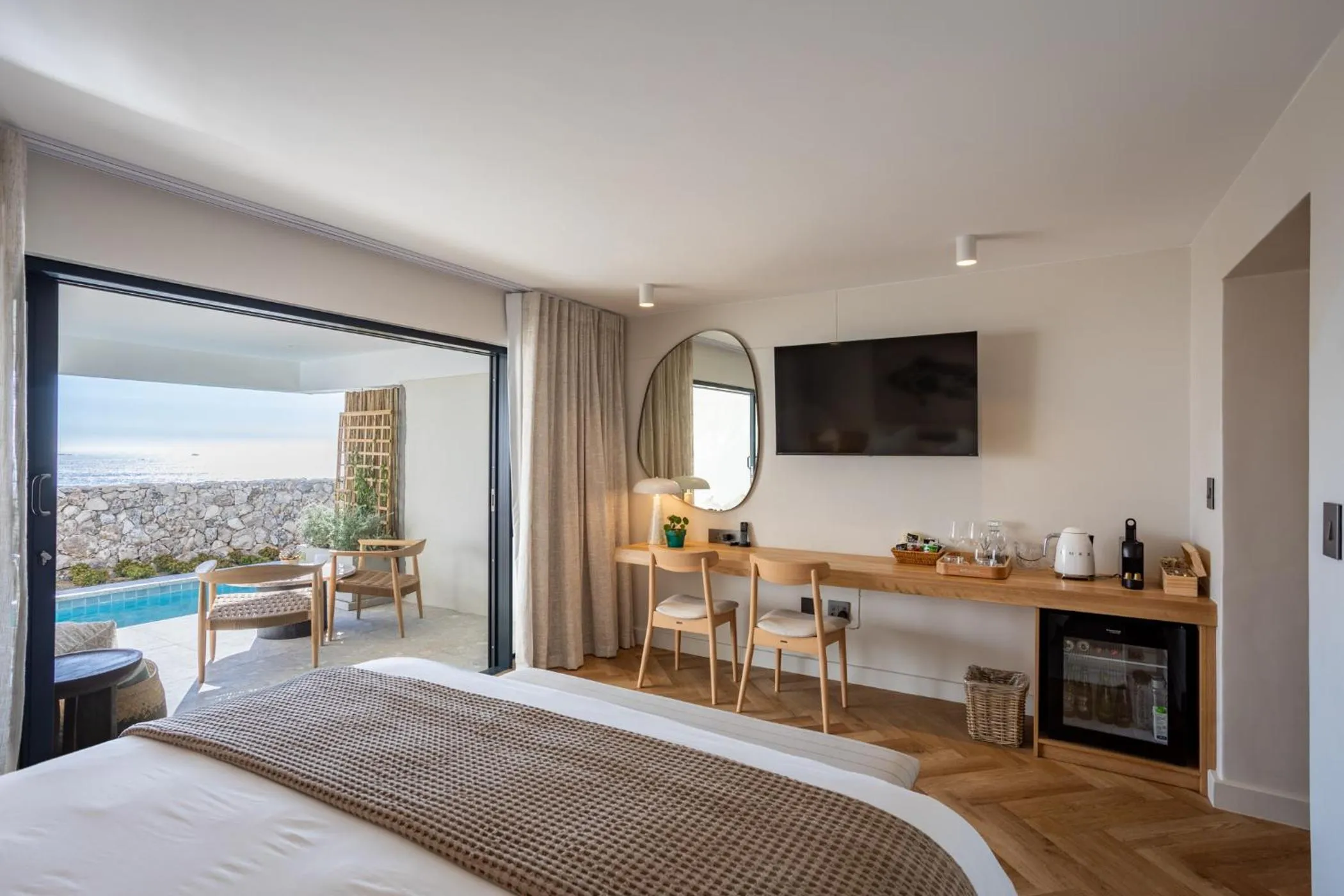 Bed in Abalone Hotel & Villas