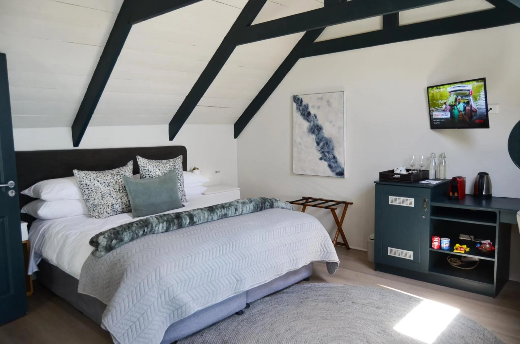 Bed in Abalone Hotel & Villas