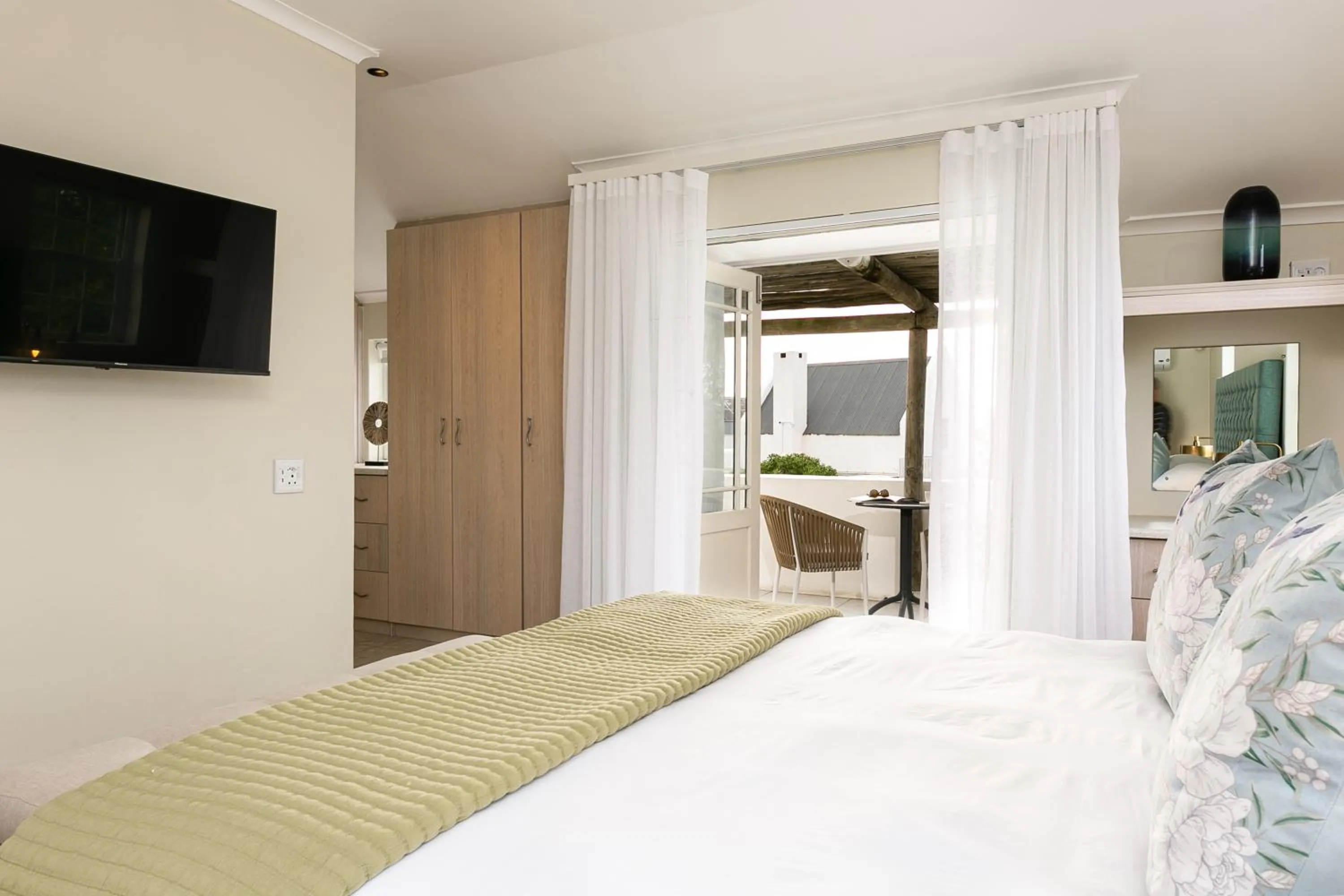 Bed in Abalone Hotel & Villas