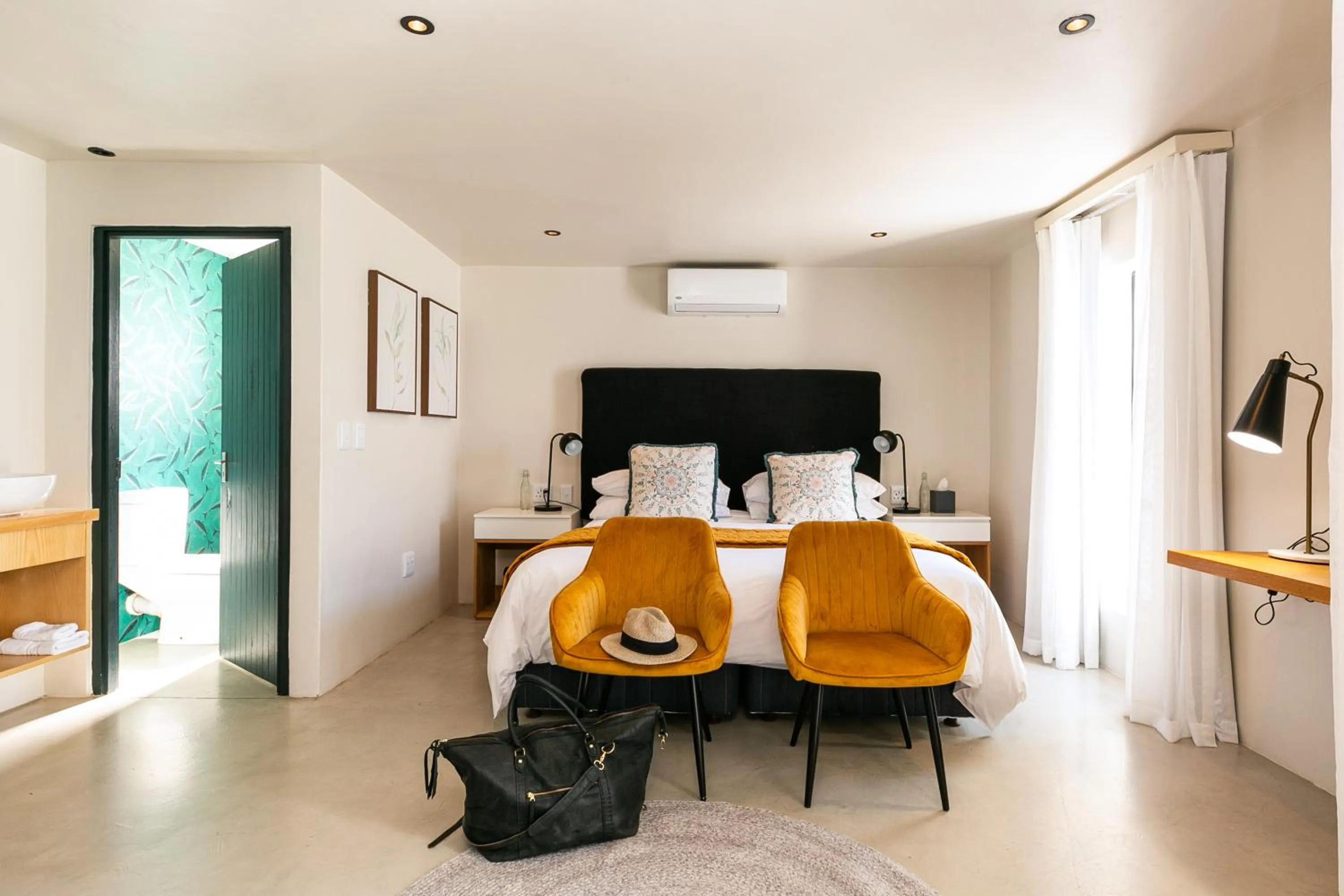 Bed in Abalone Hotel & Villas