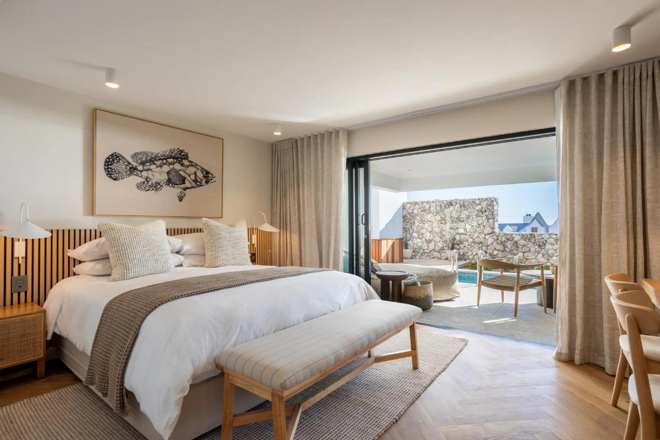 Bed in Abalone Hotel & Villas