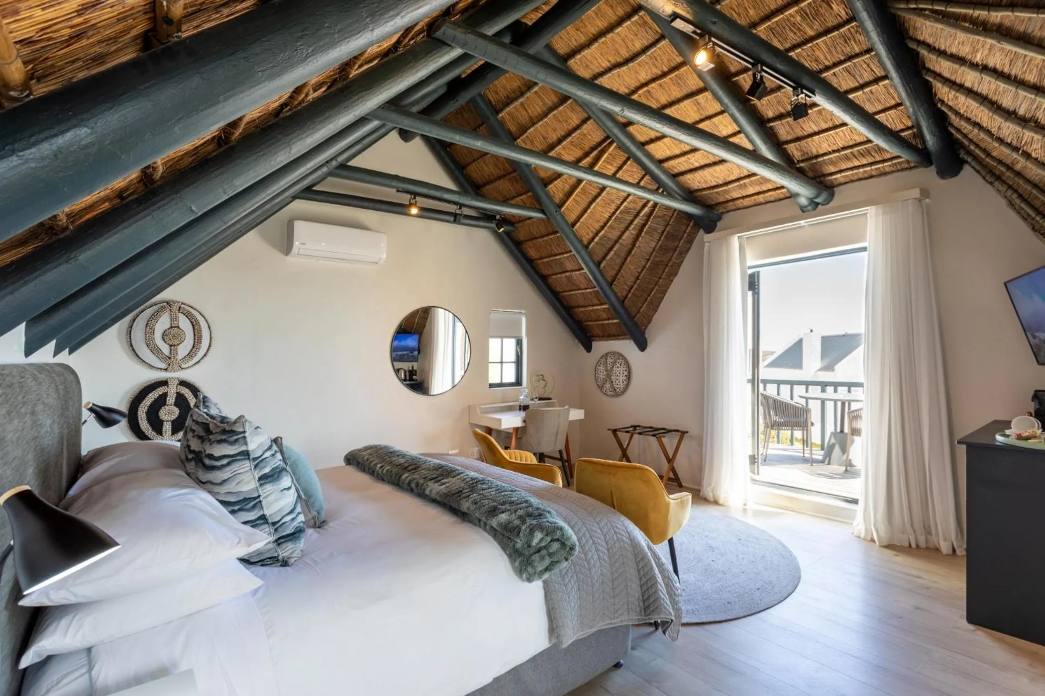 Bed in Abalone Hotel & Villas