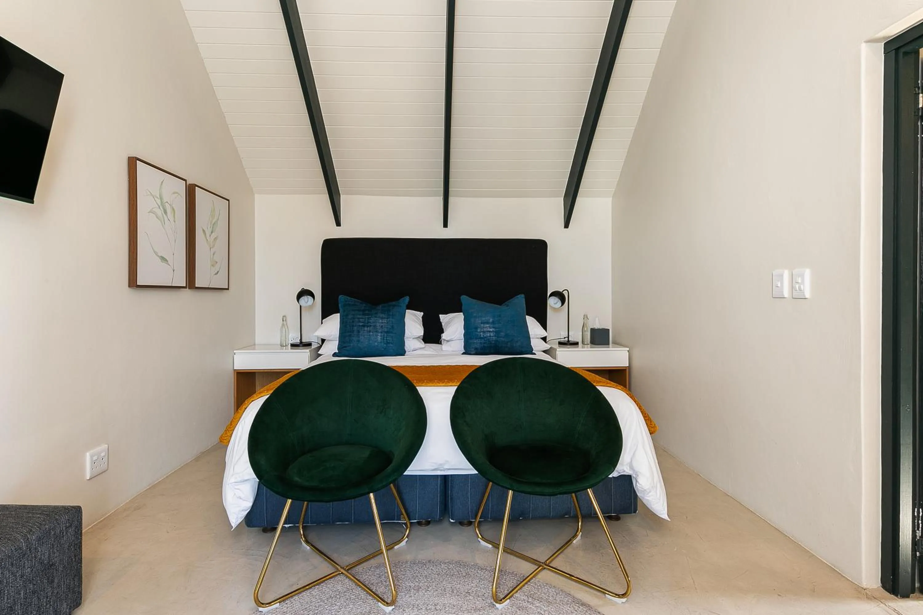 Bed in Abalone Hotel & Villas