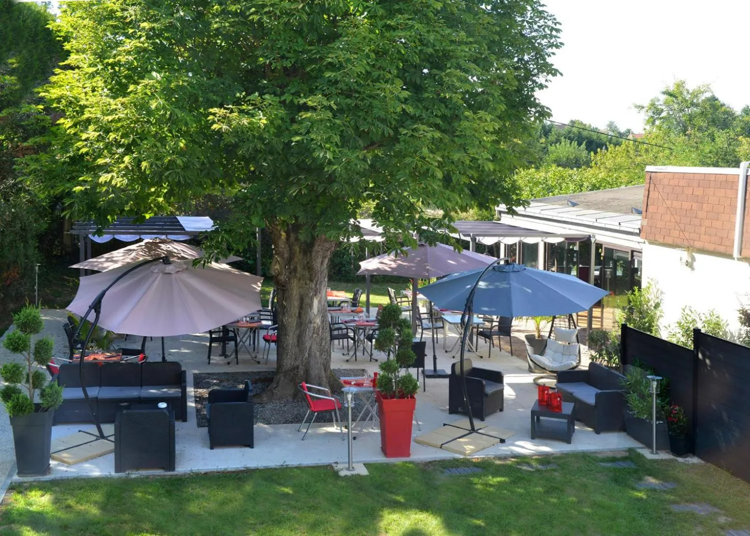 Patio in Logis Hotel Le Prieure