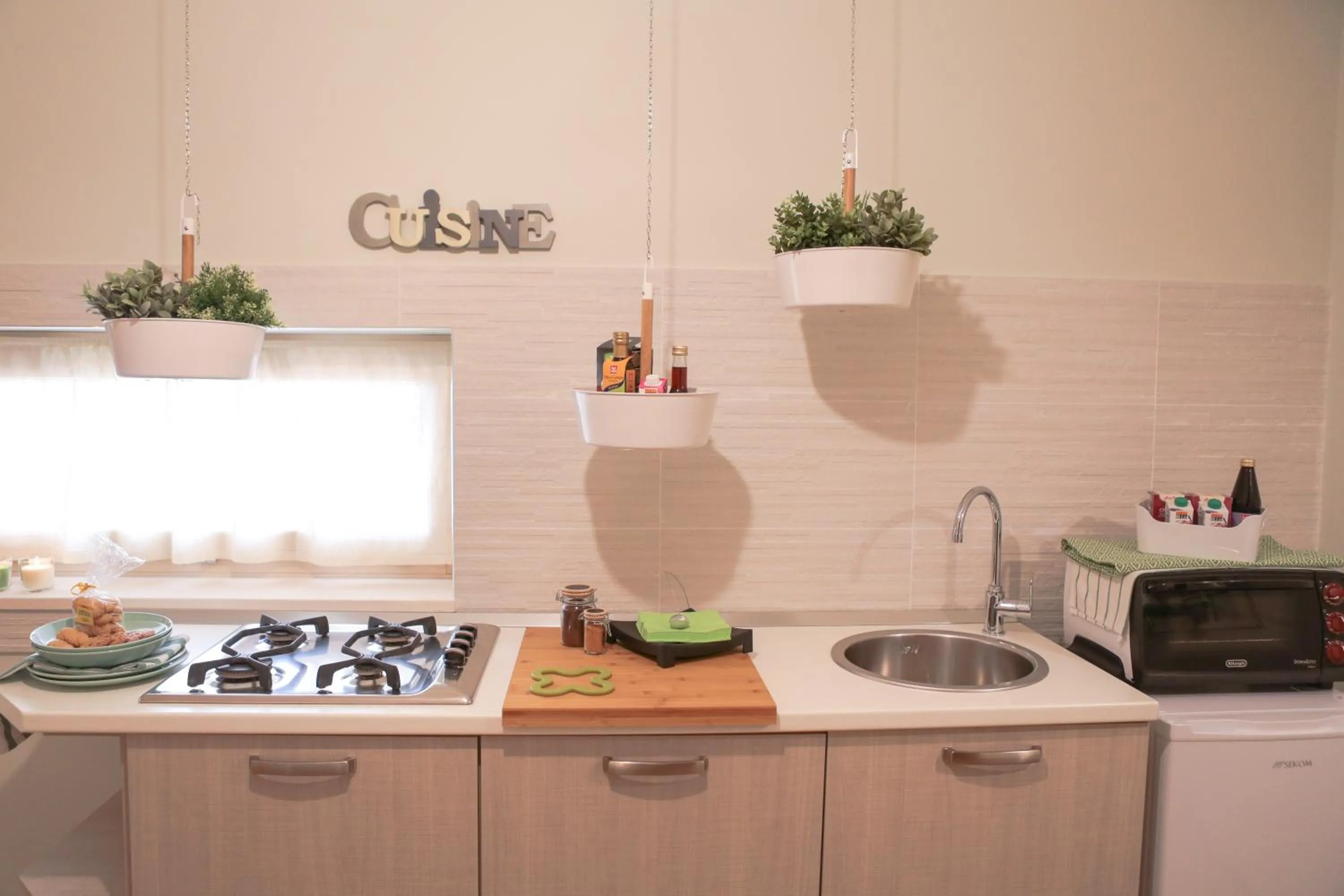 Communal kitchen in Casa Riccardo Urban B&Bio