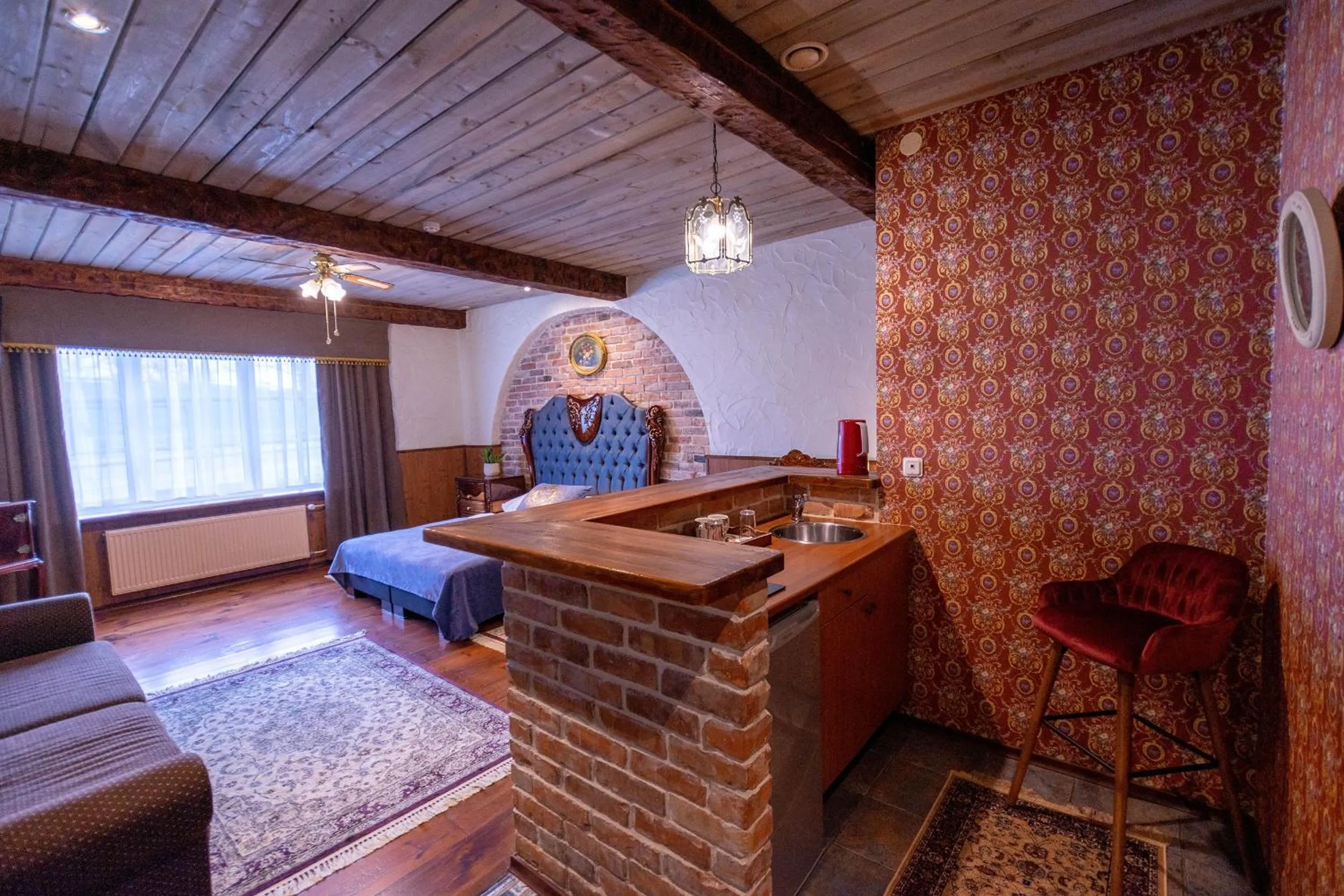 Kitchen or kitchenette, Bed in Hansa Hotel