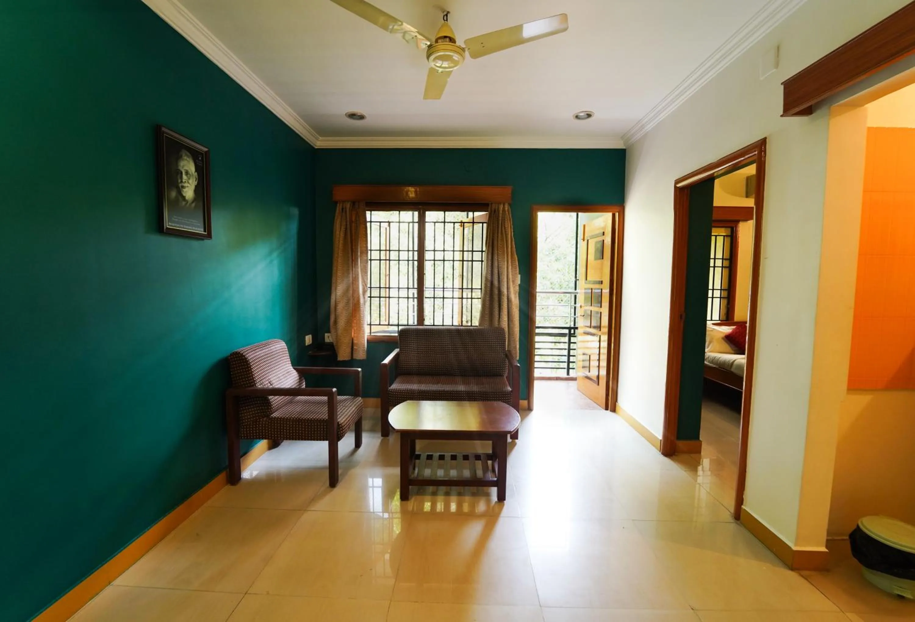 Seating area in HOTEL THIRD EYE by RAMANA TOWERS