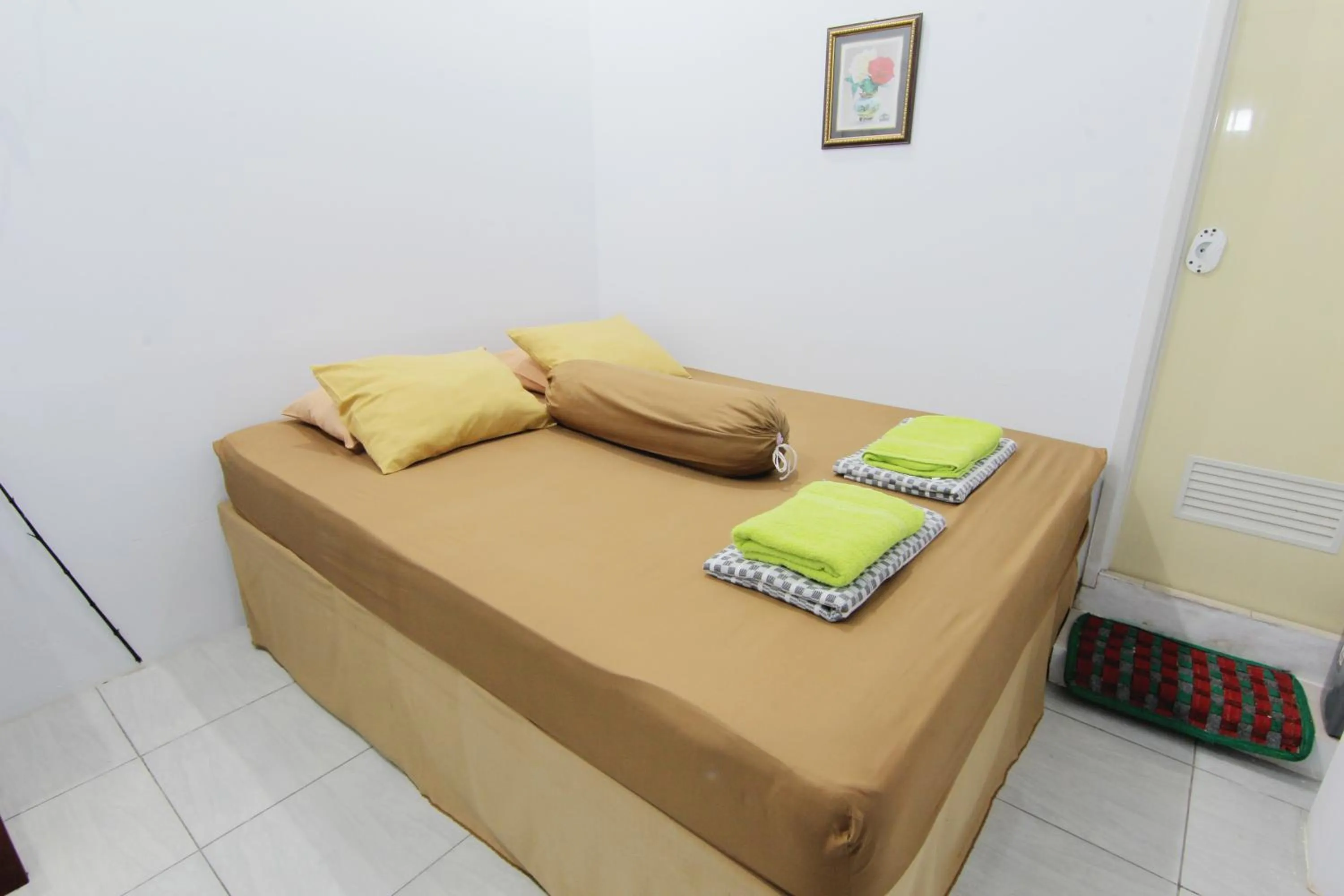 Bed in Tiga Dua Homestay