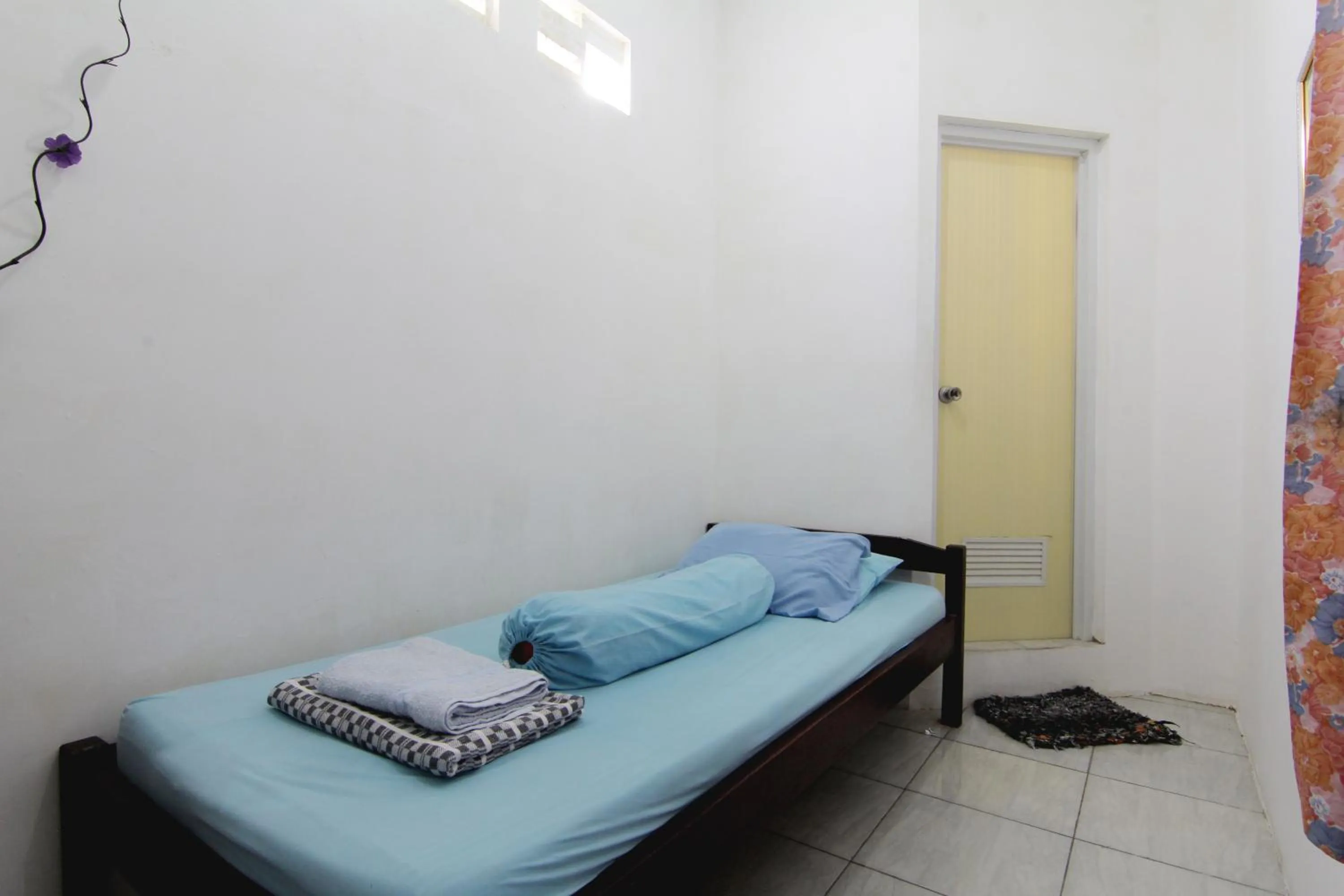 Photo of the whole room, Bed in Tiga Dua Homestay