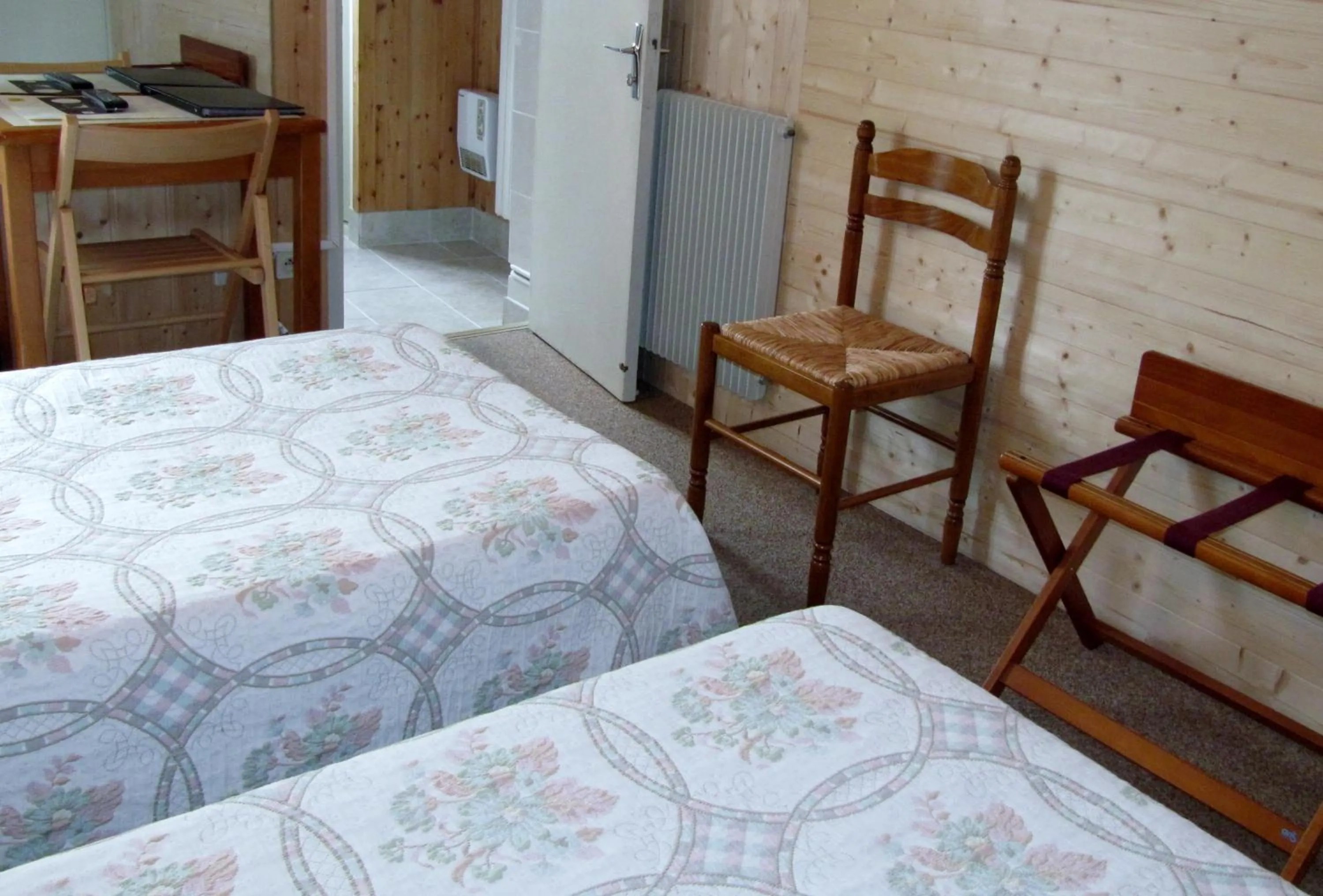 Bed in Hôtel Des Rochers