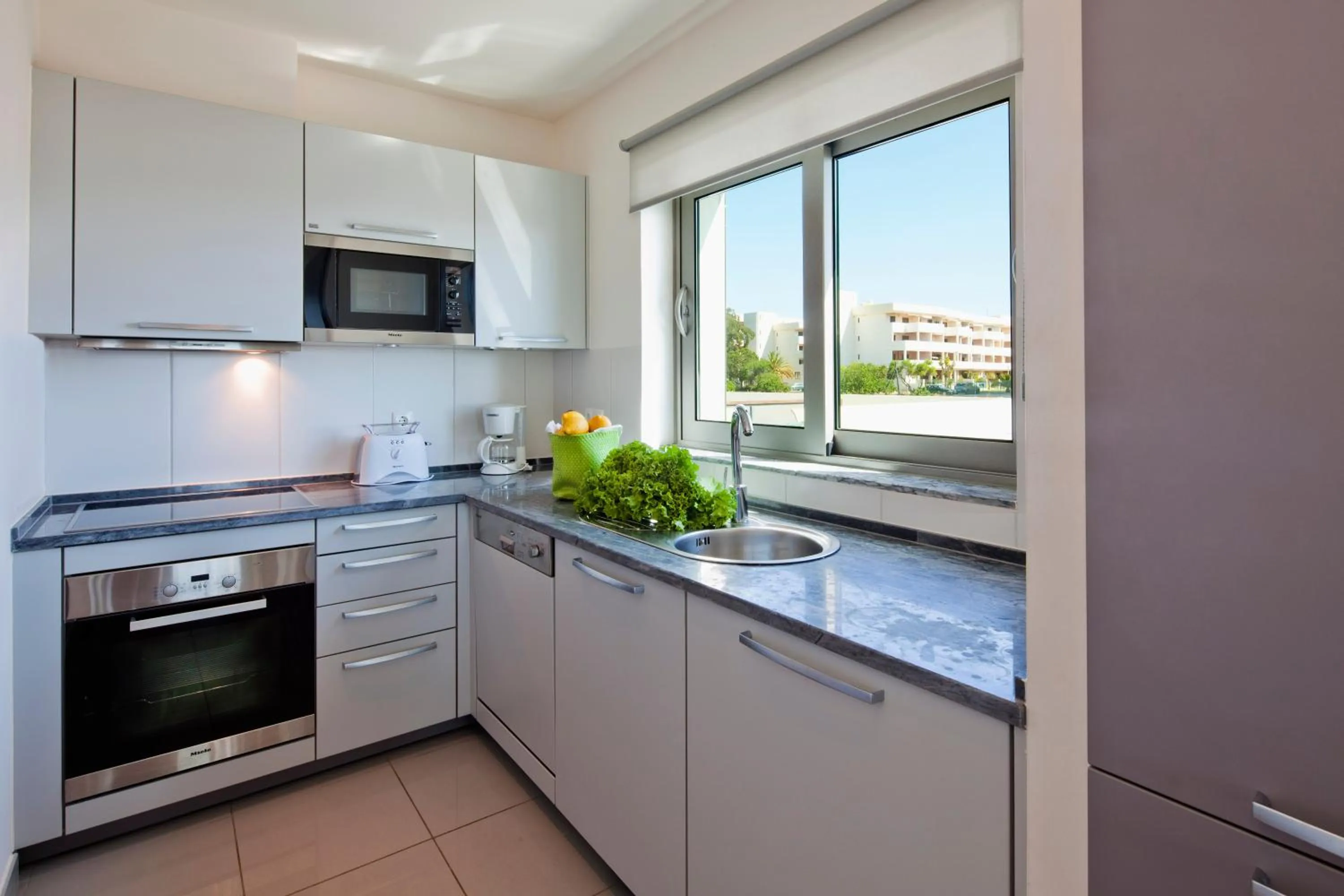 Kitchen or kitchenette in Villa Doris Suites