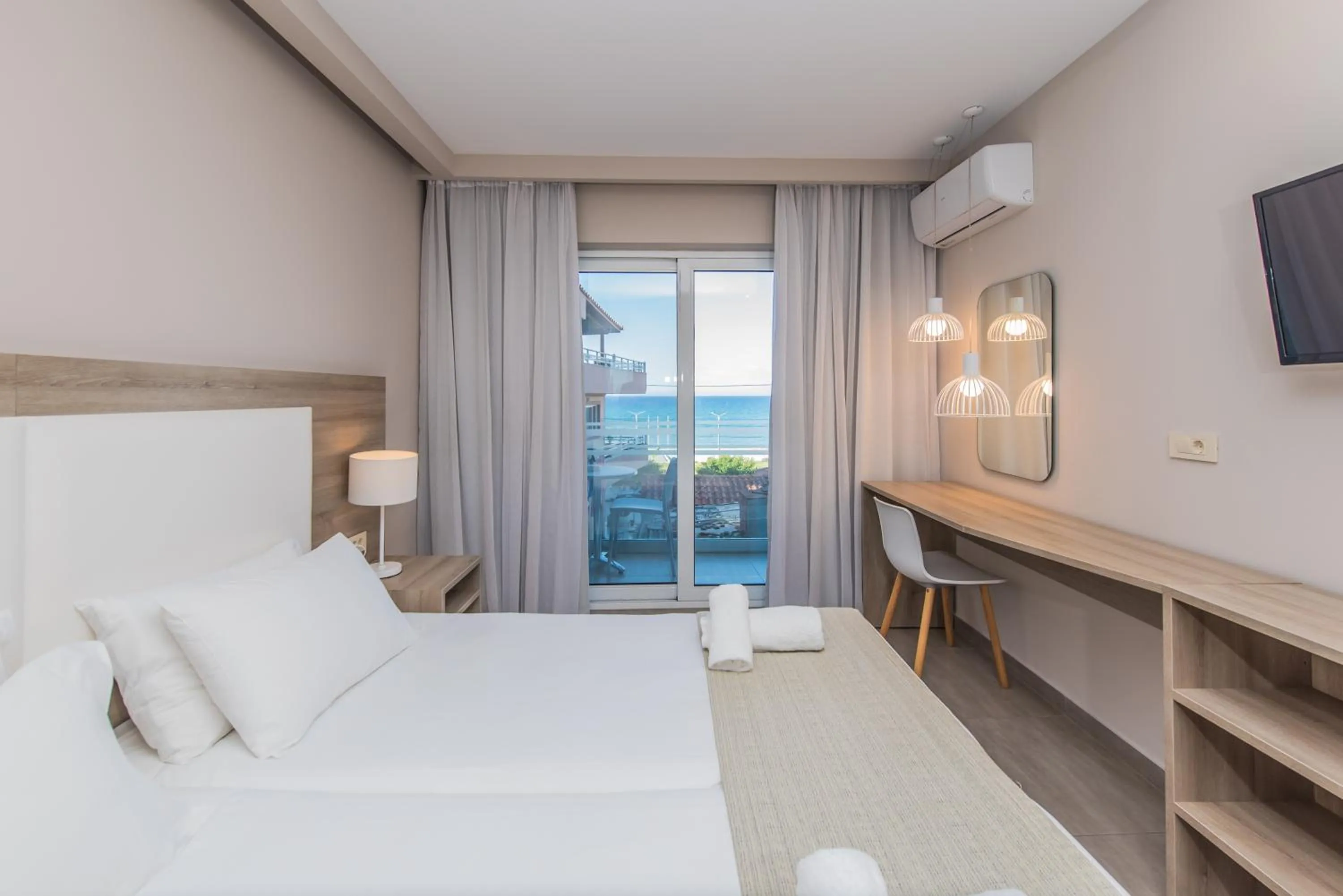 Photo of the whole room, Bed in Porto Planos Beach Hotel