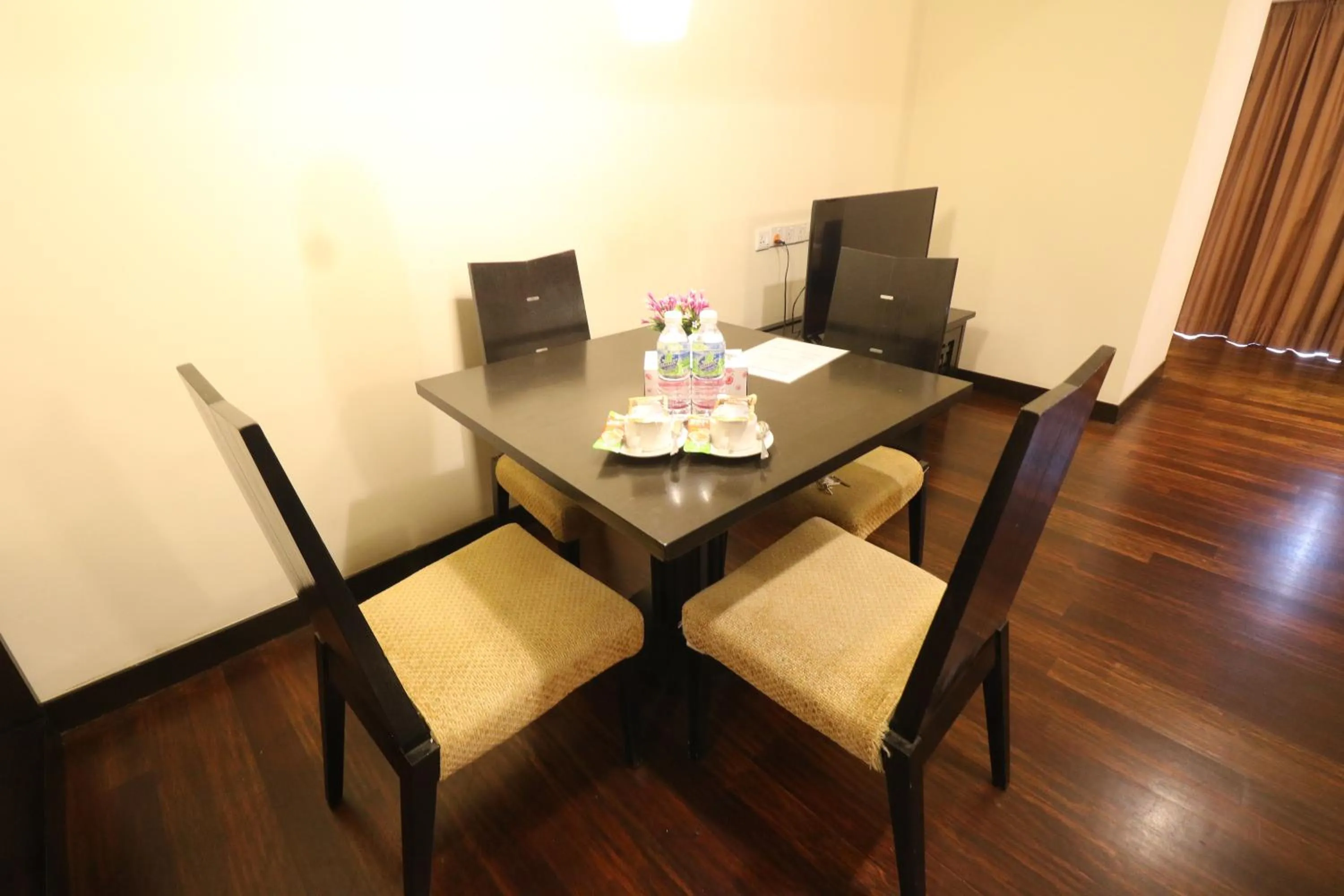 Dining area in Raintree Resort Suites