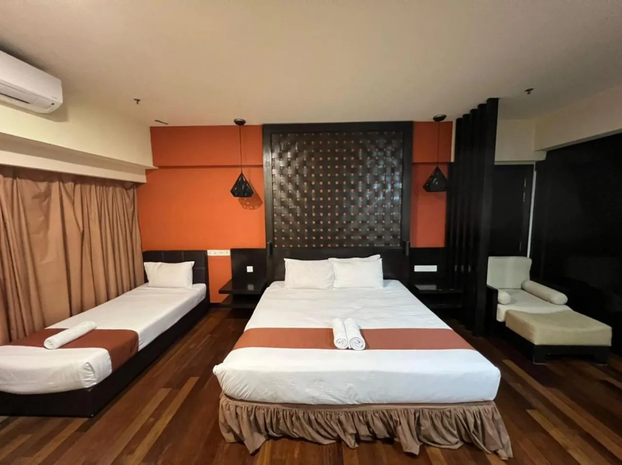 Bed in Raintree Resort Suites