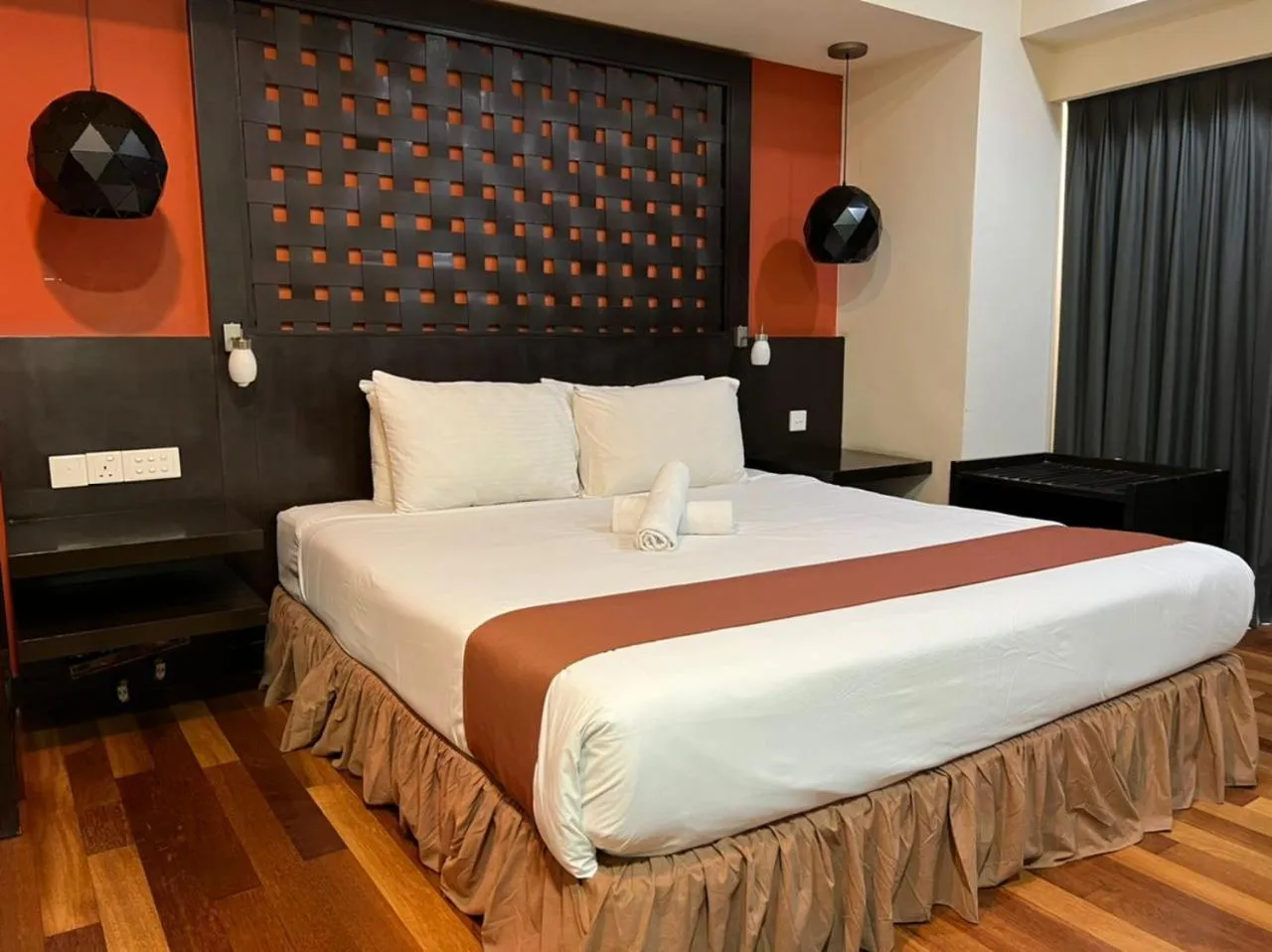 Bed in Raintree Resort Suites