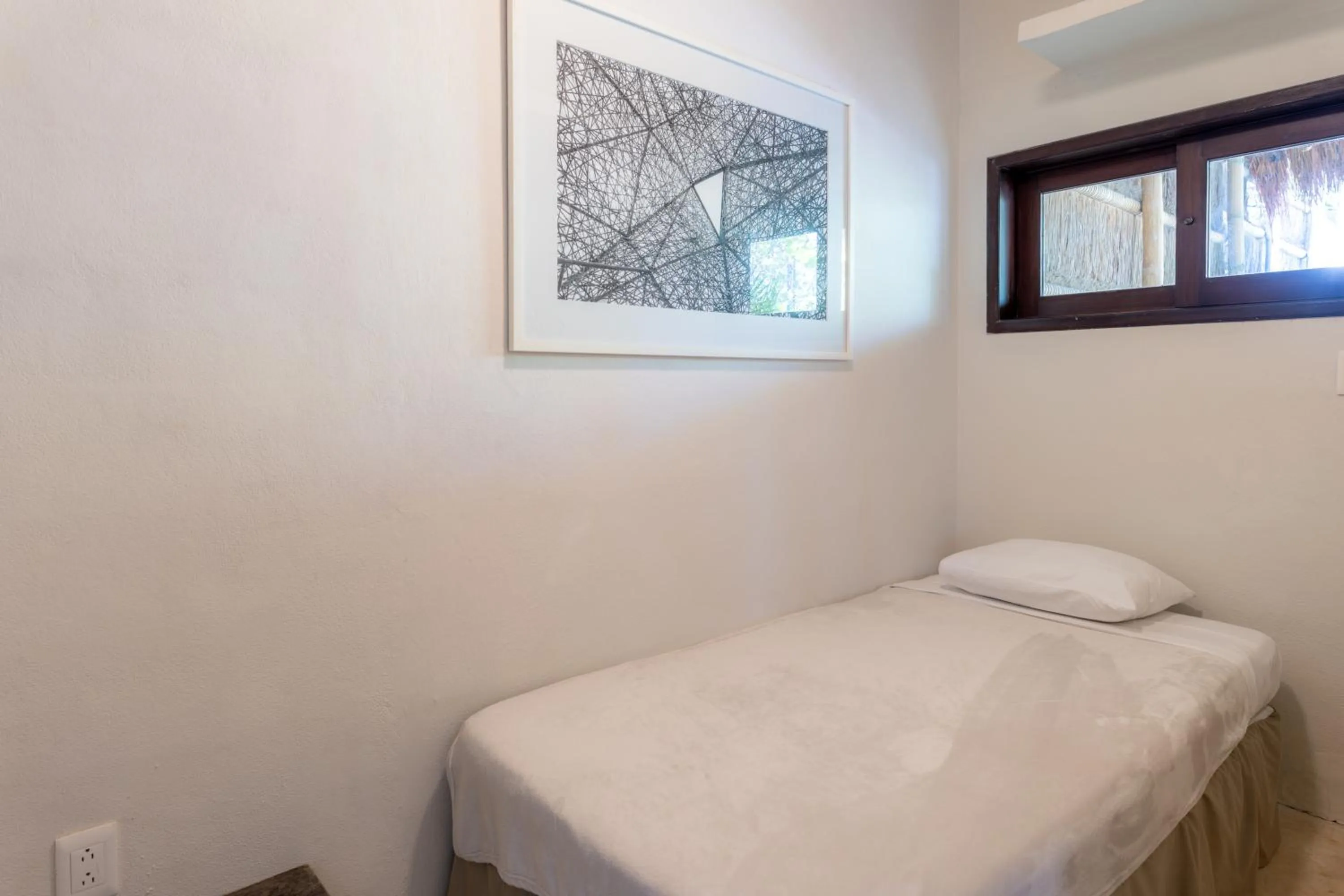 Bed in Hotel Villas Flamingos