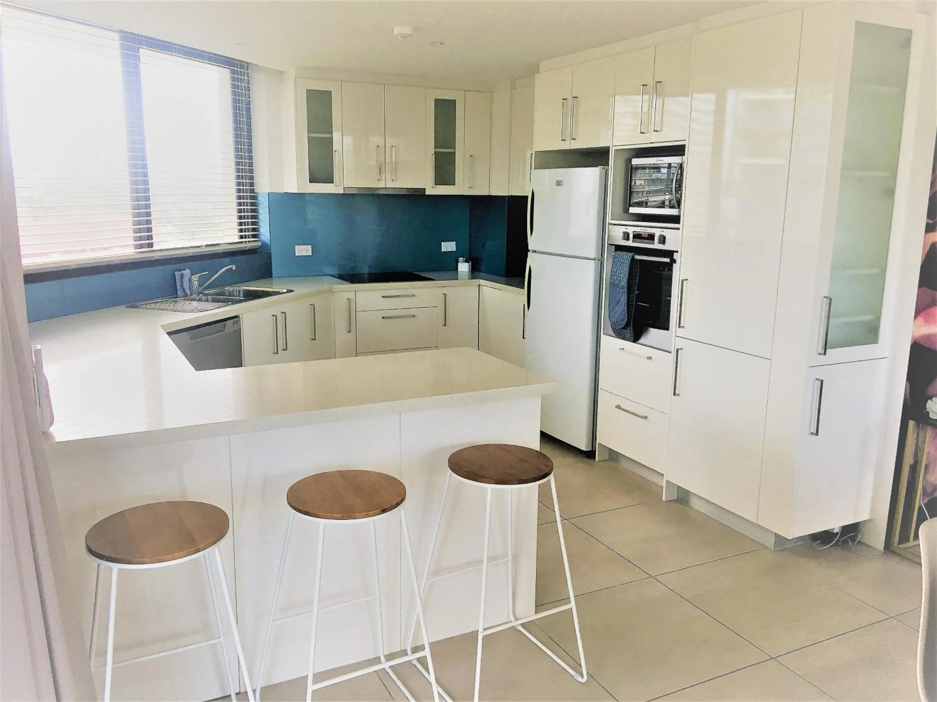 Kitchen or kitchenette in Genesis Apartments by Gold Coast Premium