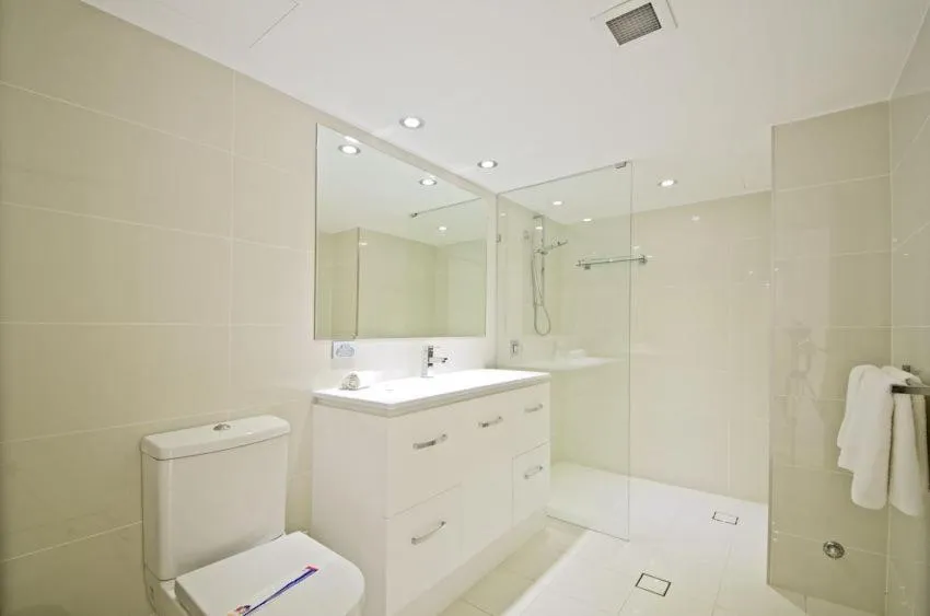 Shower in Genesis Apartments by Gold Coast Premium