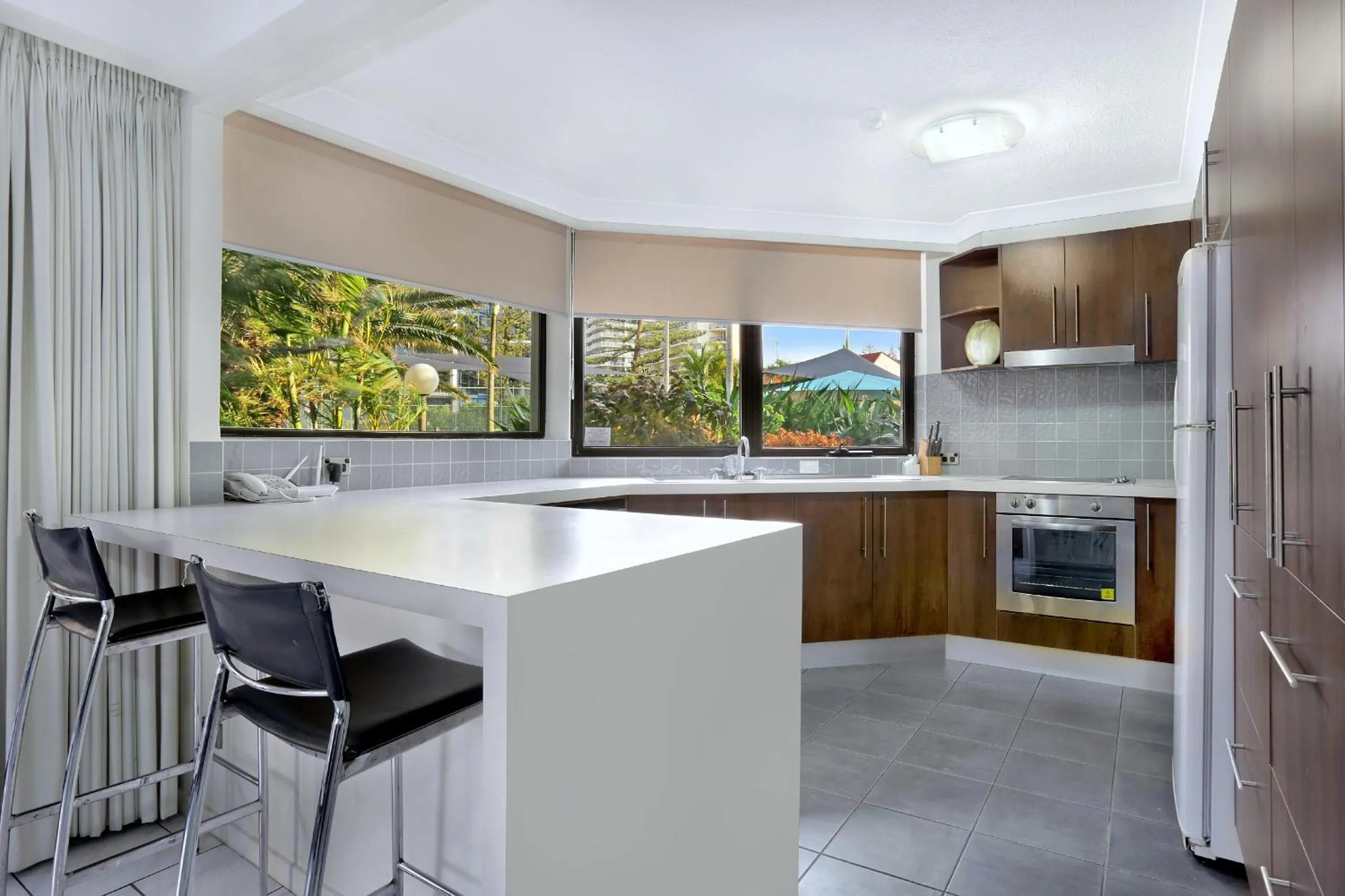 Kitchen or kitchenette in Genesis Apartments by Gold Coast Premium