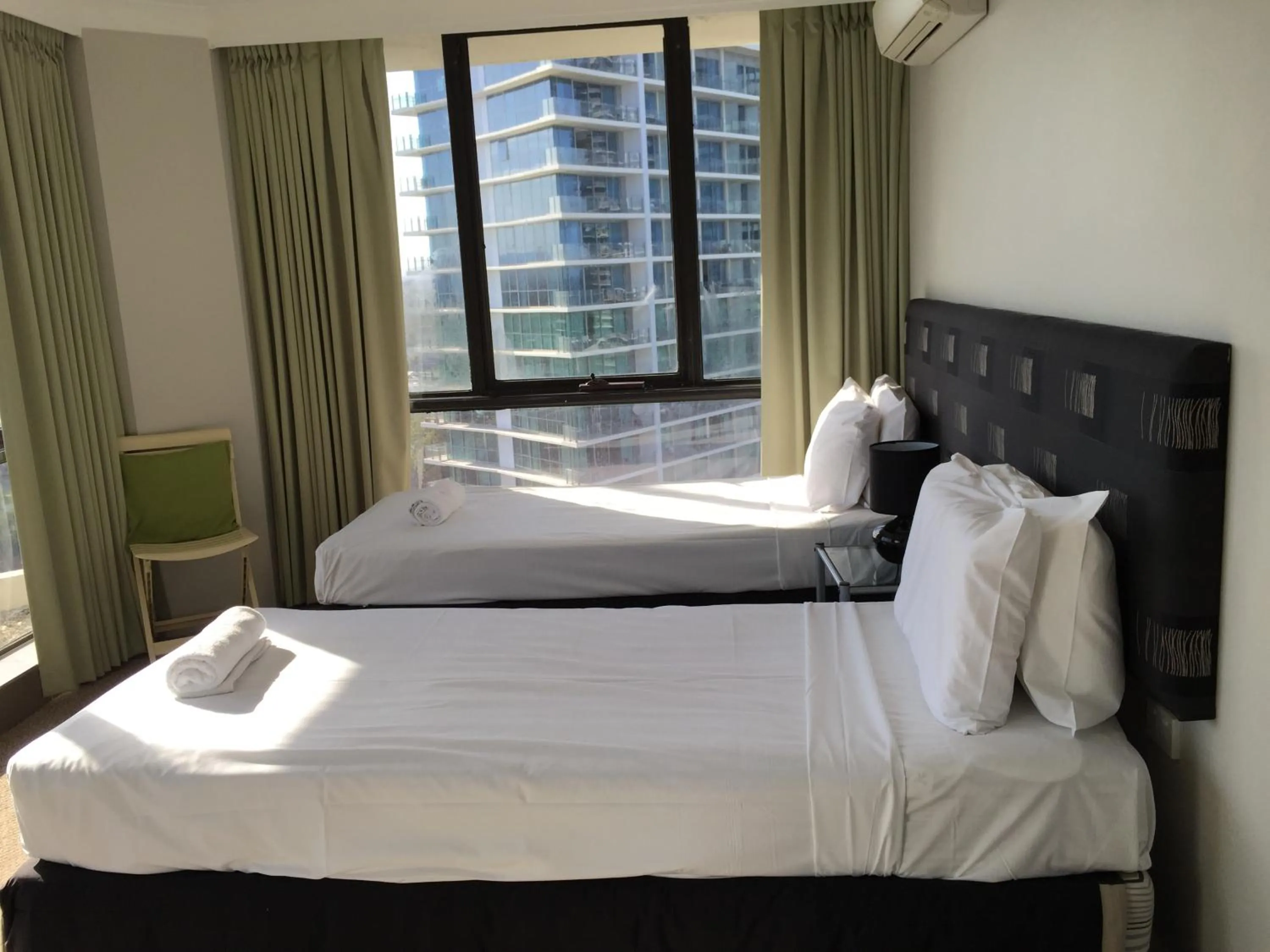 Bedroom, Bed in Genesis Apartments by Gold Coast Premium
