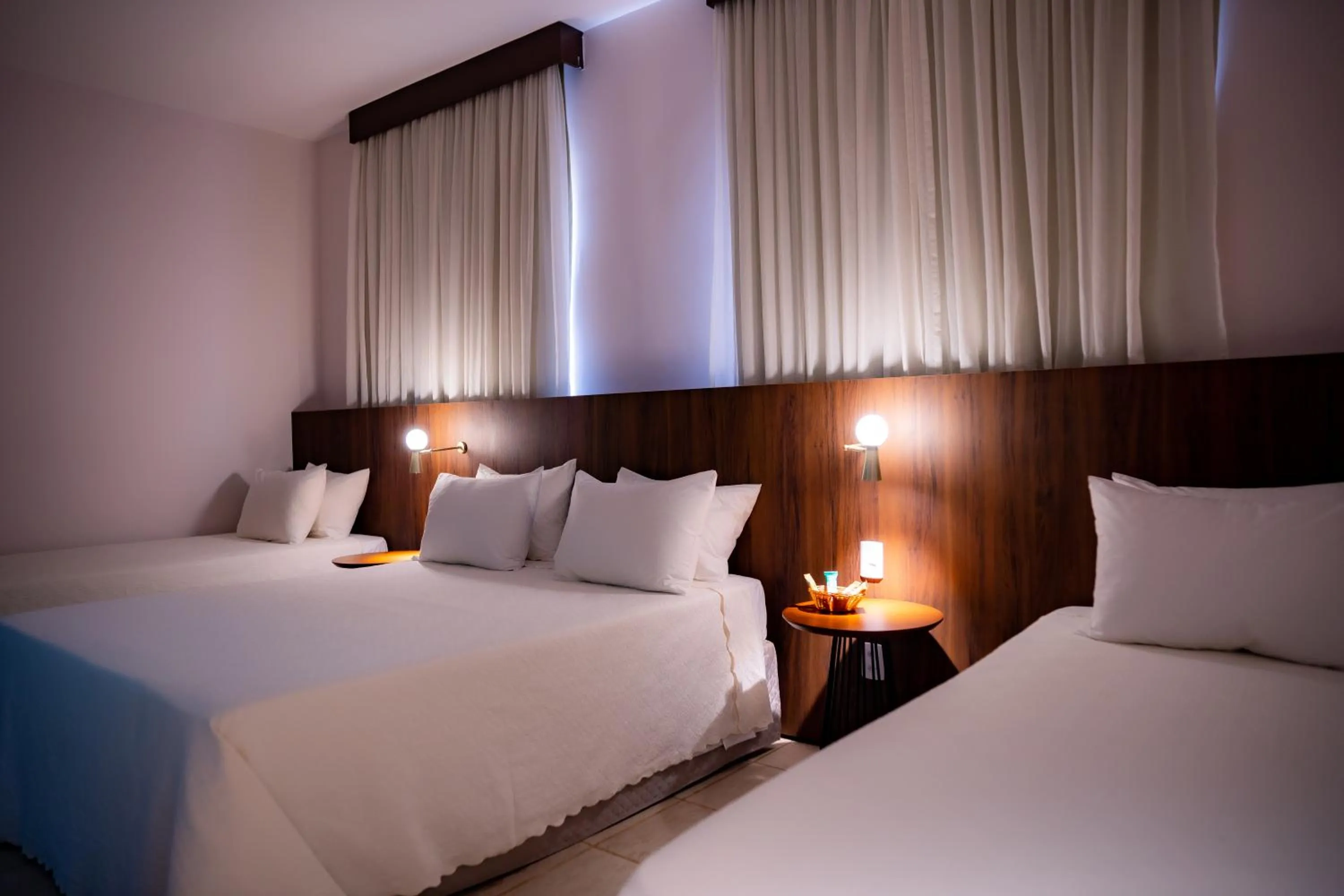 Bed in Hotel Santos Dumont