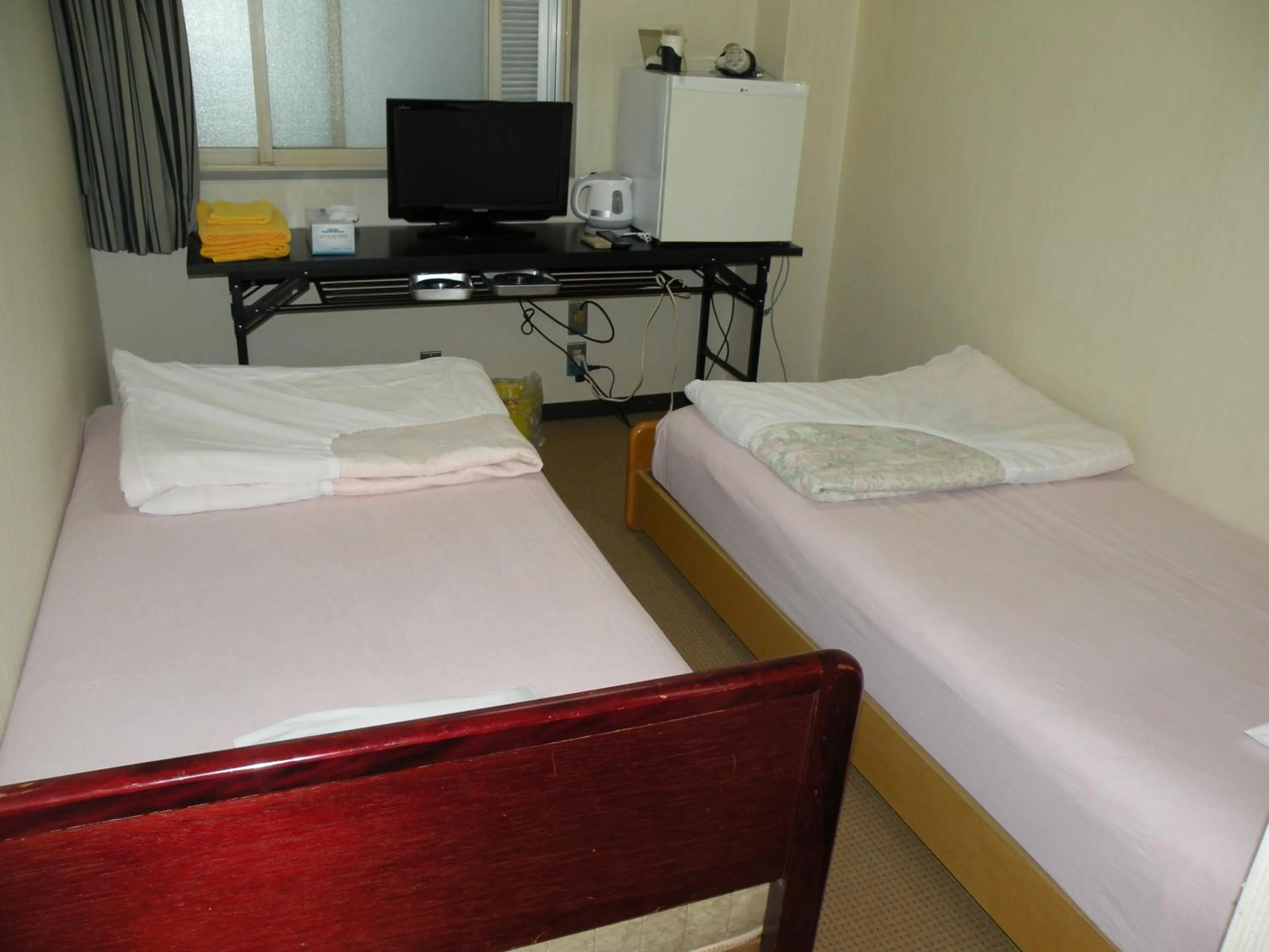 Bed in Business Hotel Minshuku Minato