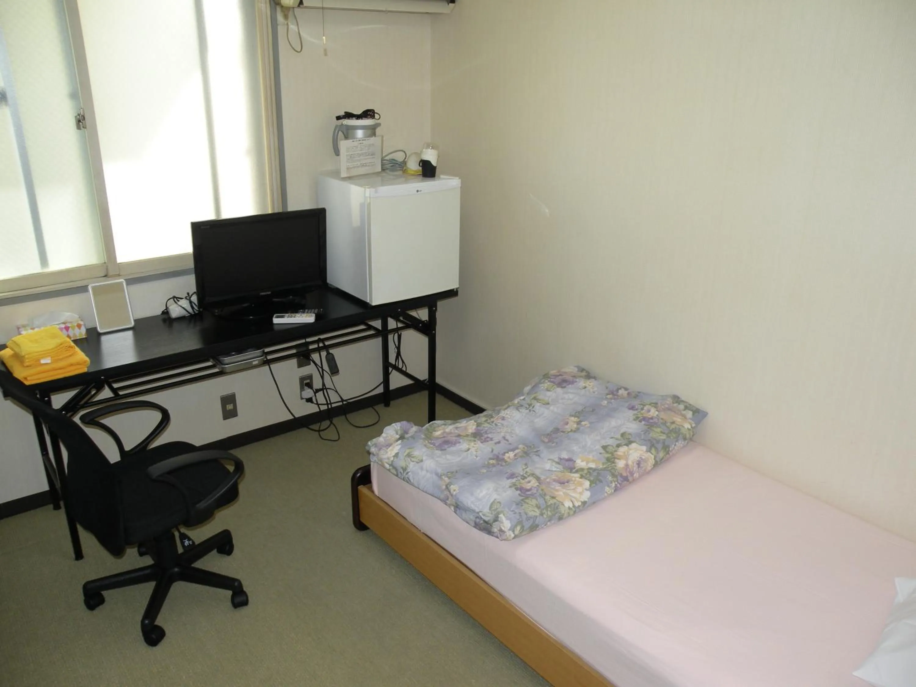 Bed in Business Hotel Minshuku Minato