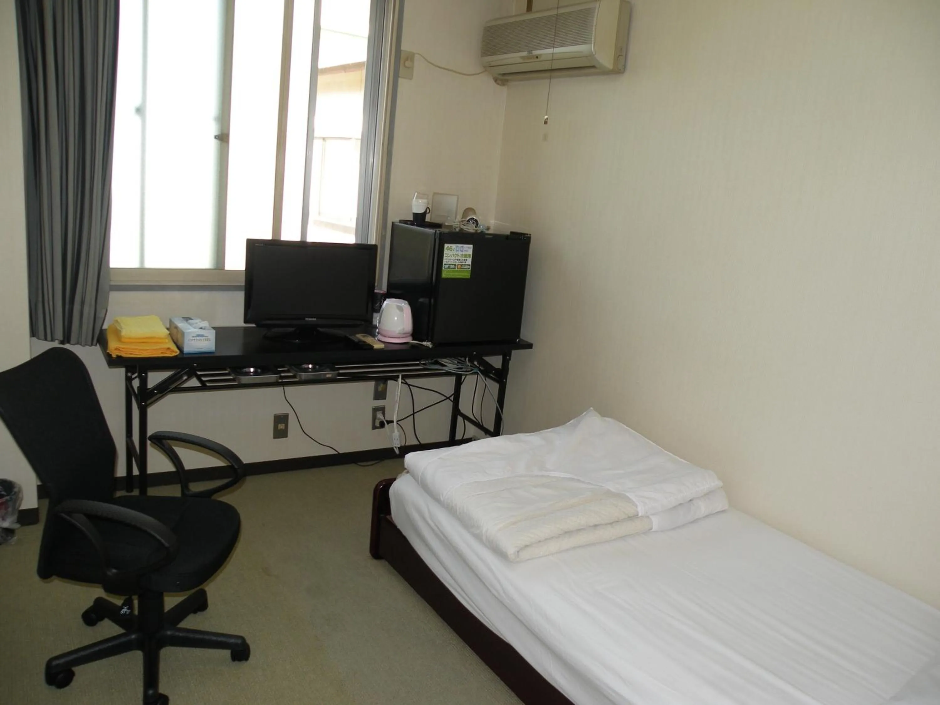 Bed in Business Hotel Minshuku Minato